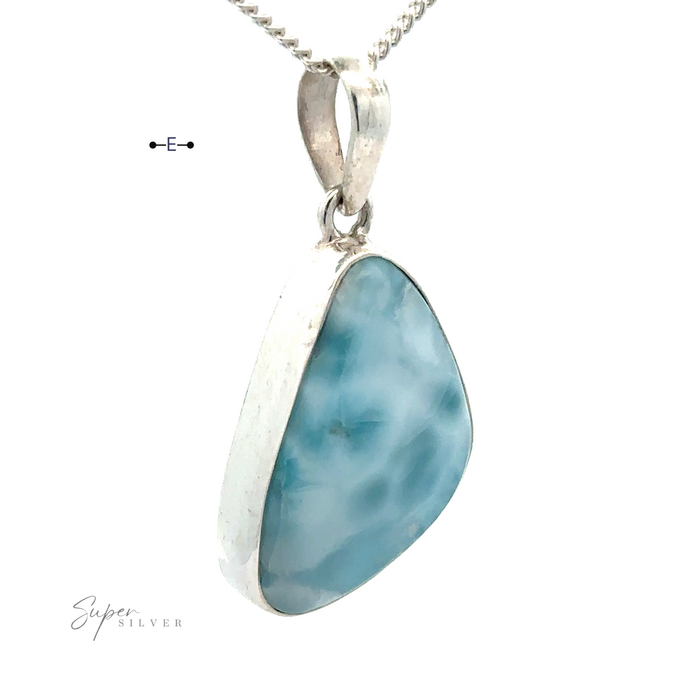 
                  
                    A Freeform Shape Larimar Pendant with a triangular, polished blue Larimar stone that boasts a marbled appearance. The chain is not included, allowing you to pair it with your favorite sterling silver chain for a personalized touch.
                  
                