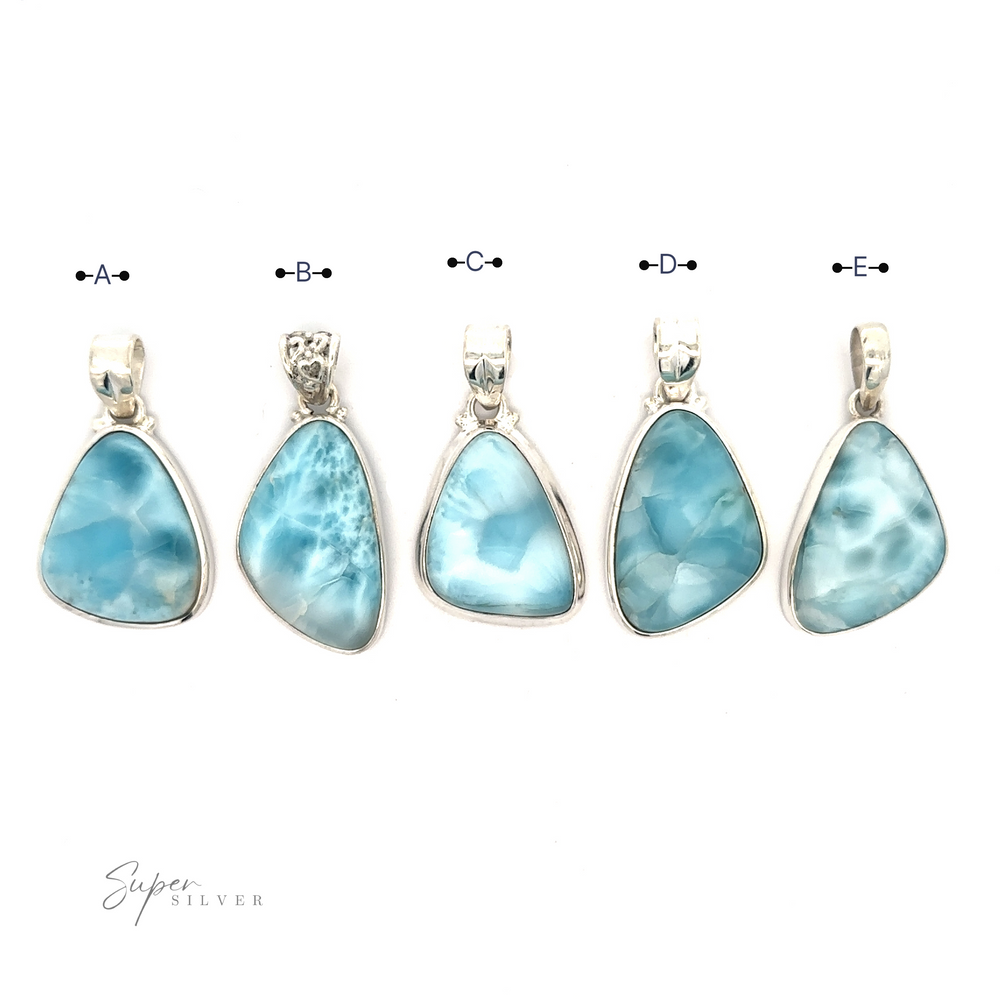 
                  
                    Five blue Freeform Shape Larimar Pendants labeled A to E, each set in a sterling silver frame. The stones vary slightly in shape and pattern. The background is plain white with the text "Super Silver" in the bottom left corner. Chain not included.
                  
                