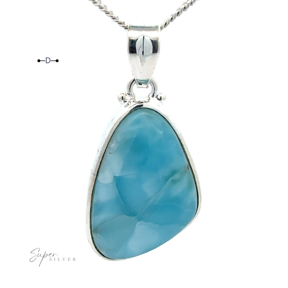 
                  
                    A Freeform Shape Larimar Pendant with a large, irregularly-shaped Larimar gemstone hangs on a silver chain.
                  
                