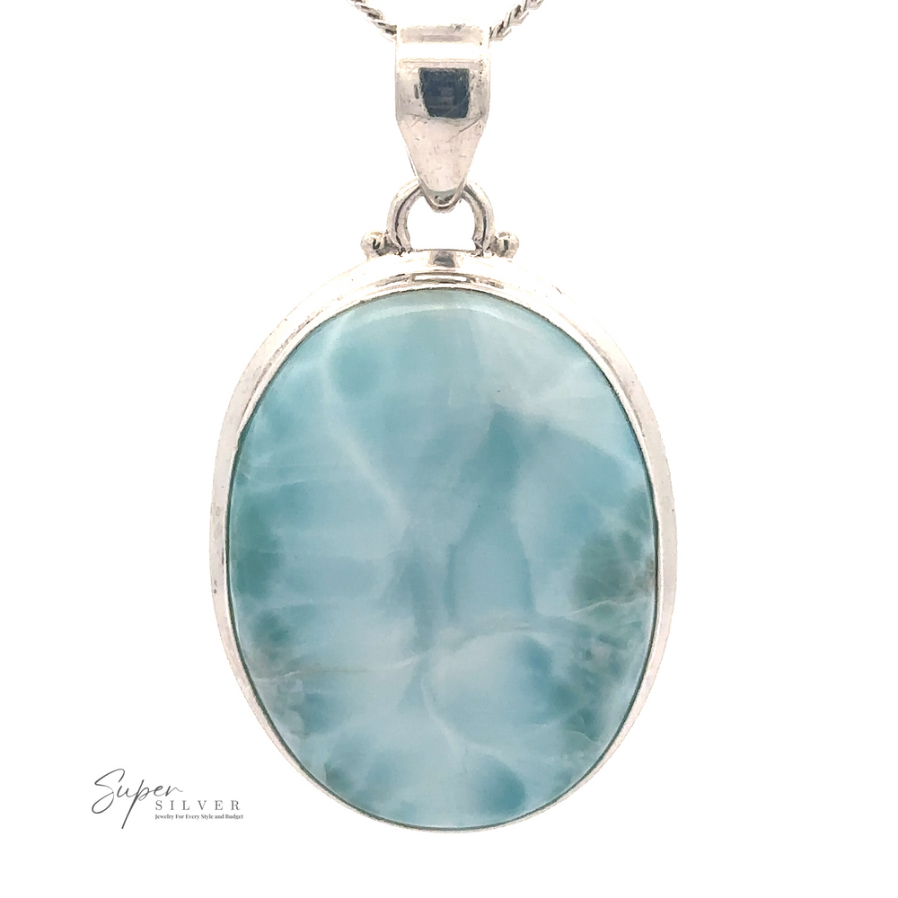 
                  
                    A Simple Oval Larimar Pendant featuring an oval blue gemstone in the center, perfect for everyday wear.
                  
                