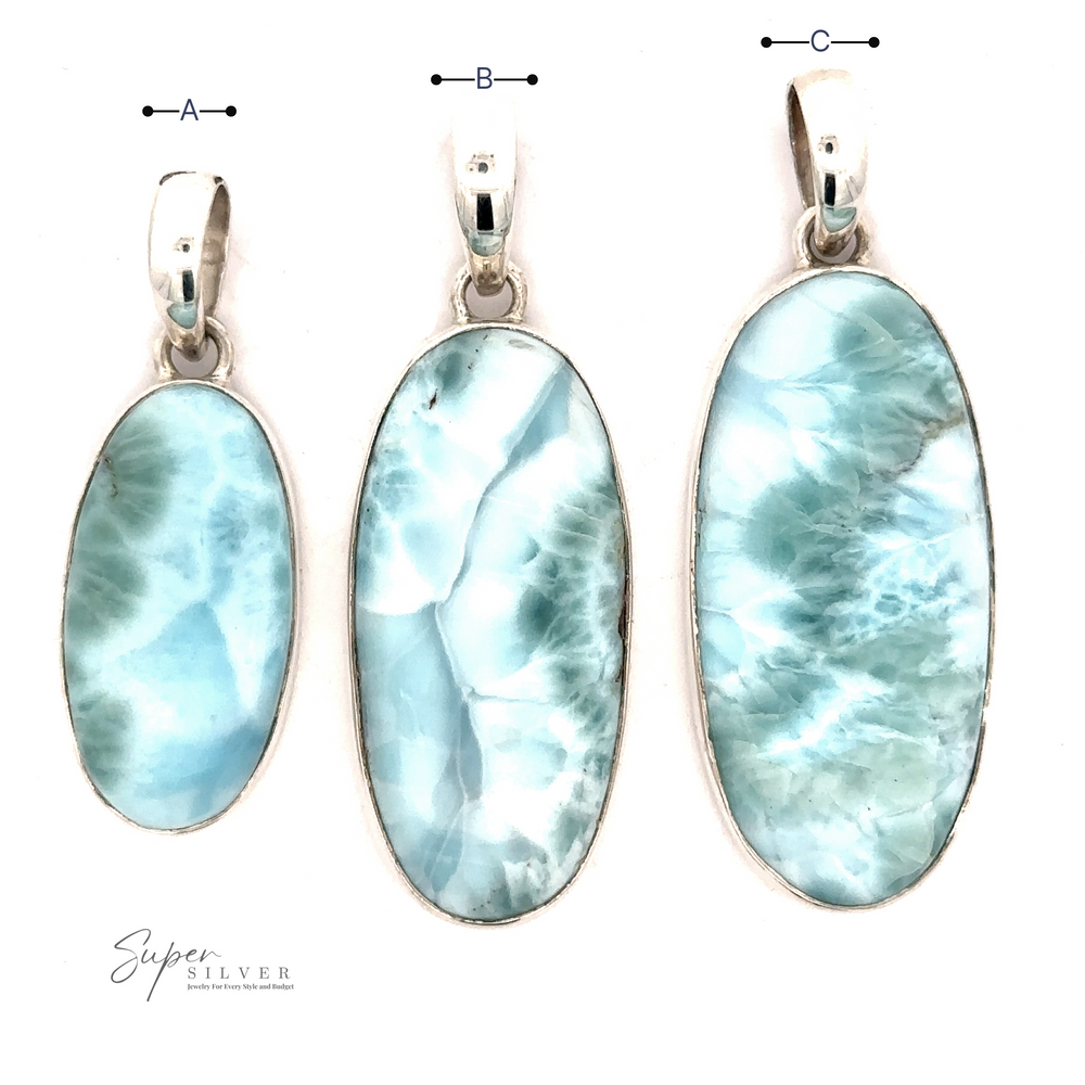 Three blue Beautiful Long Oval Larimar Pendants with .925 Sterling Silver settings arranged in a row. Pendants vary in size, labeled A, B, and C. The gemstones from the Dominican Republic have a marbled blue and white pattern.
