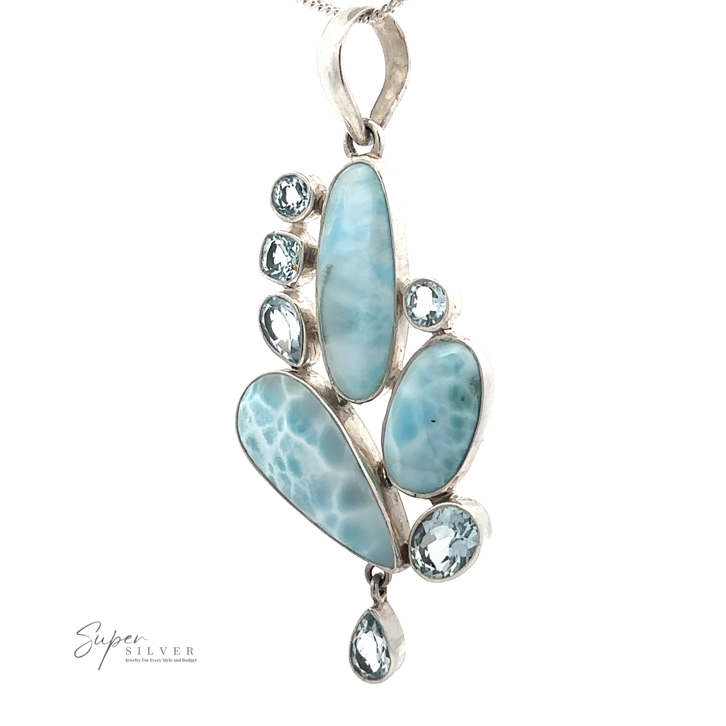 
                  
                    A beautiful Larimar and Blue Topaz pendant featuring multiple blue gemstones of varying shapes and sizes set in sterling silver, forming an abstract design.
                  
                