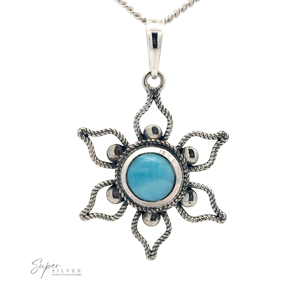 Silver pendant necklace featuring a Larimar Flower Pendant set in a flower-like design with twisted metal details, perfect for a beach day.
