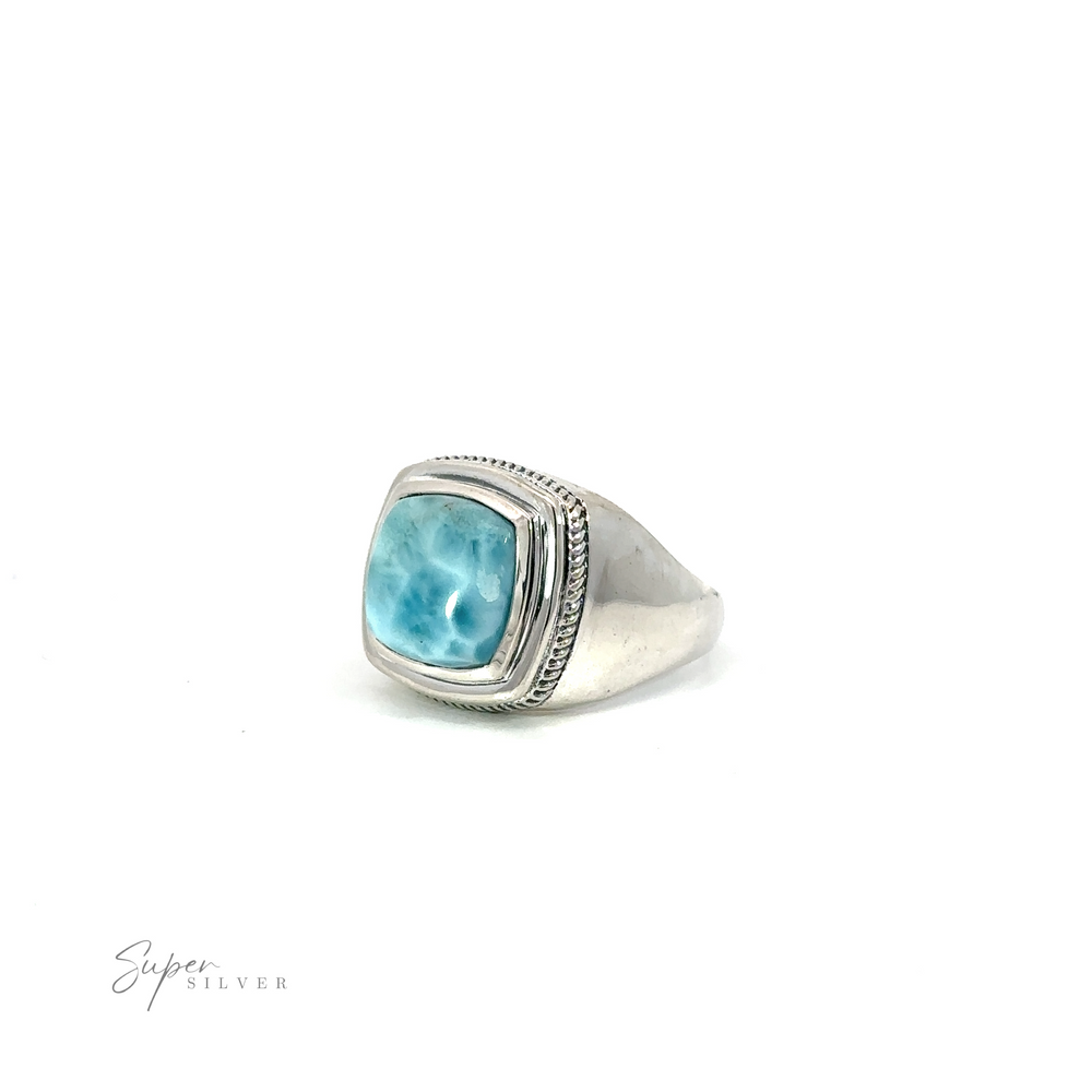 
                  
                    A silver Square Stone Signet ring with a beautiful blue gemstone in the center.
                  
                