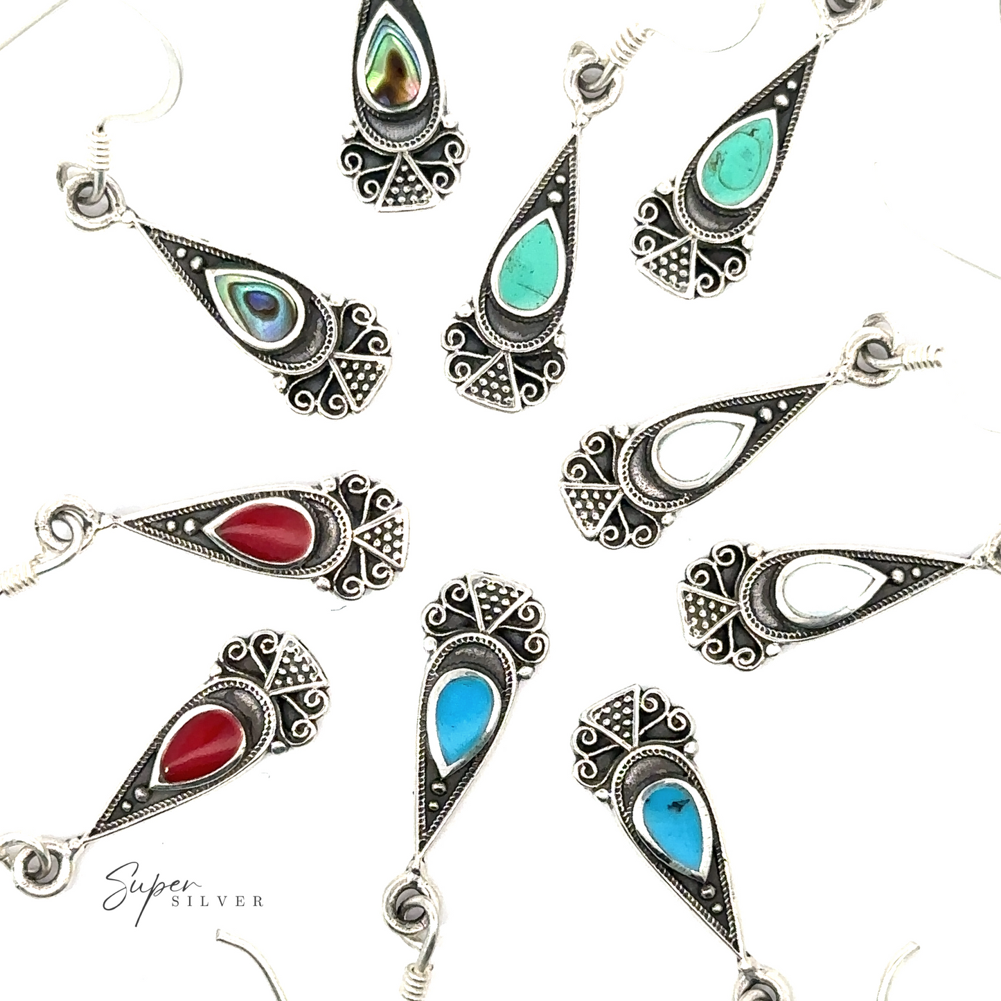 A group of Bali Inspired Teardrop Shaped Earrings With Inlay Stones, perfect for a dainty look.