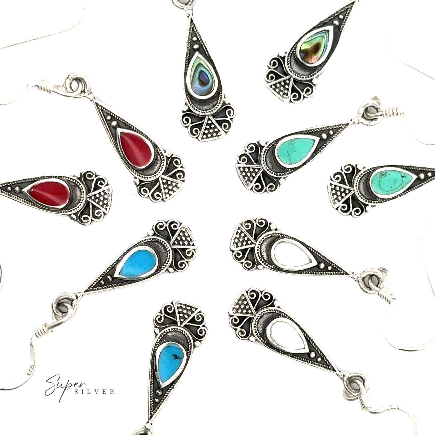 A group of Bali Inspired Teardrop Shaped Earrings with inlay stones in different colors.