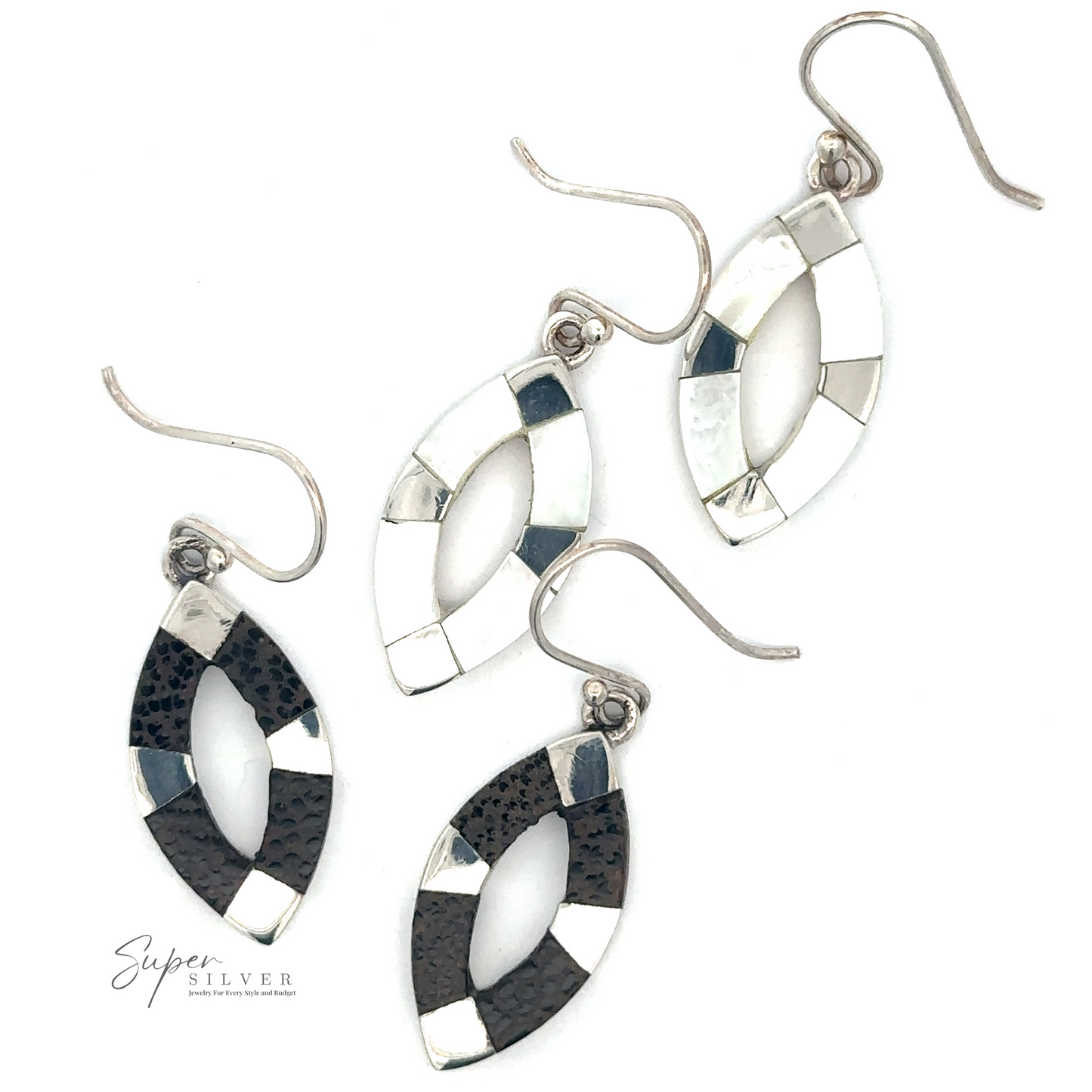 Two pairs of Inlaid Marquise Dangle Earrings; one pair features a striking combination of black and silver segments, while the other dazzles with white and silver segments, reminiscent of elegant mother of pearl earrings.