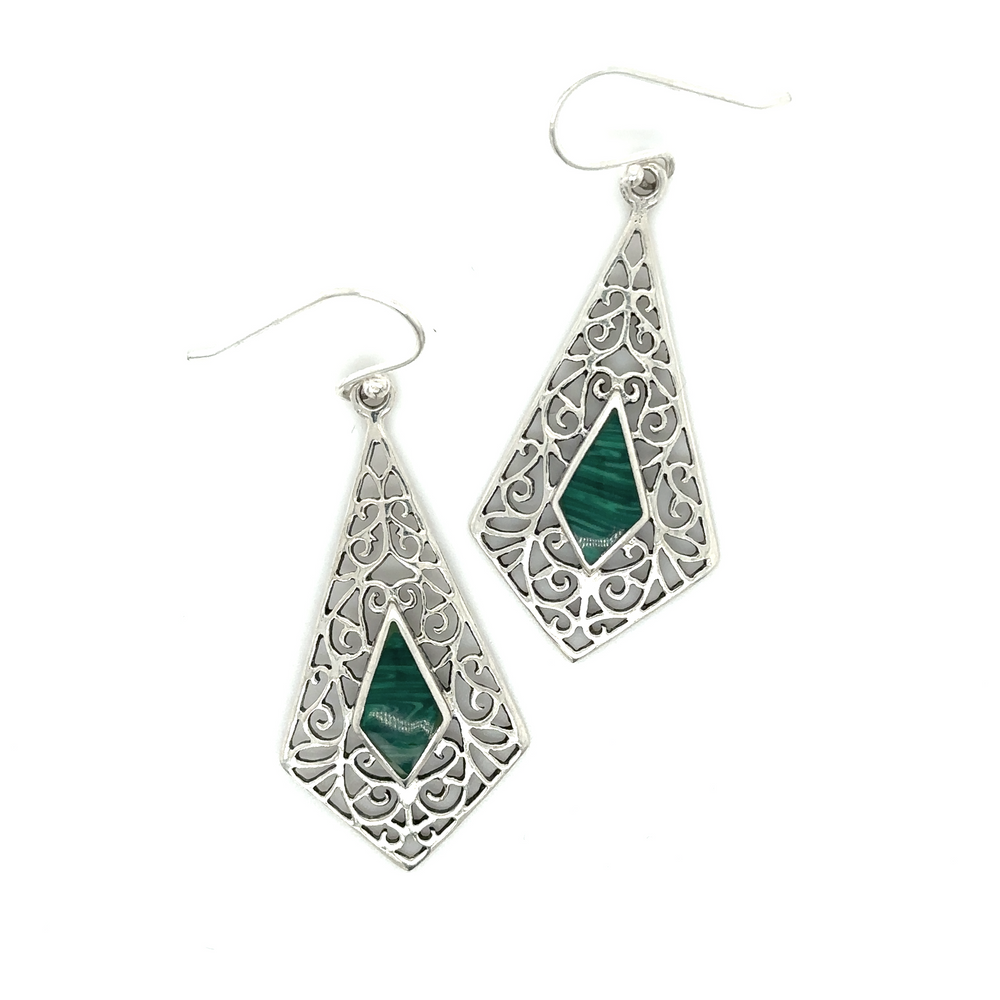 
                  
                    A pair of Super Silver Elongated Diamond Teardrop Earrings with Inlaid Stones featuring intricate filigree patterns and green stones.
                  
                