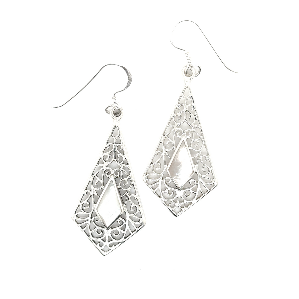 
                  
                    A pair of Super Silver Elongated Diamond Teardrop Earrings with Inlaid Stones with intricate filigree patterns.
                  
                