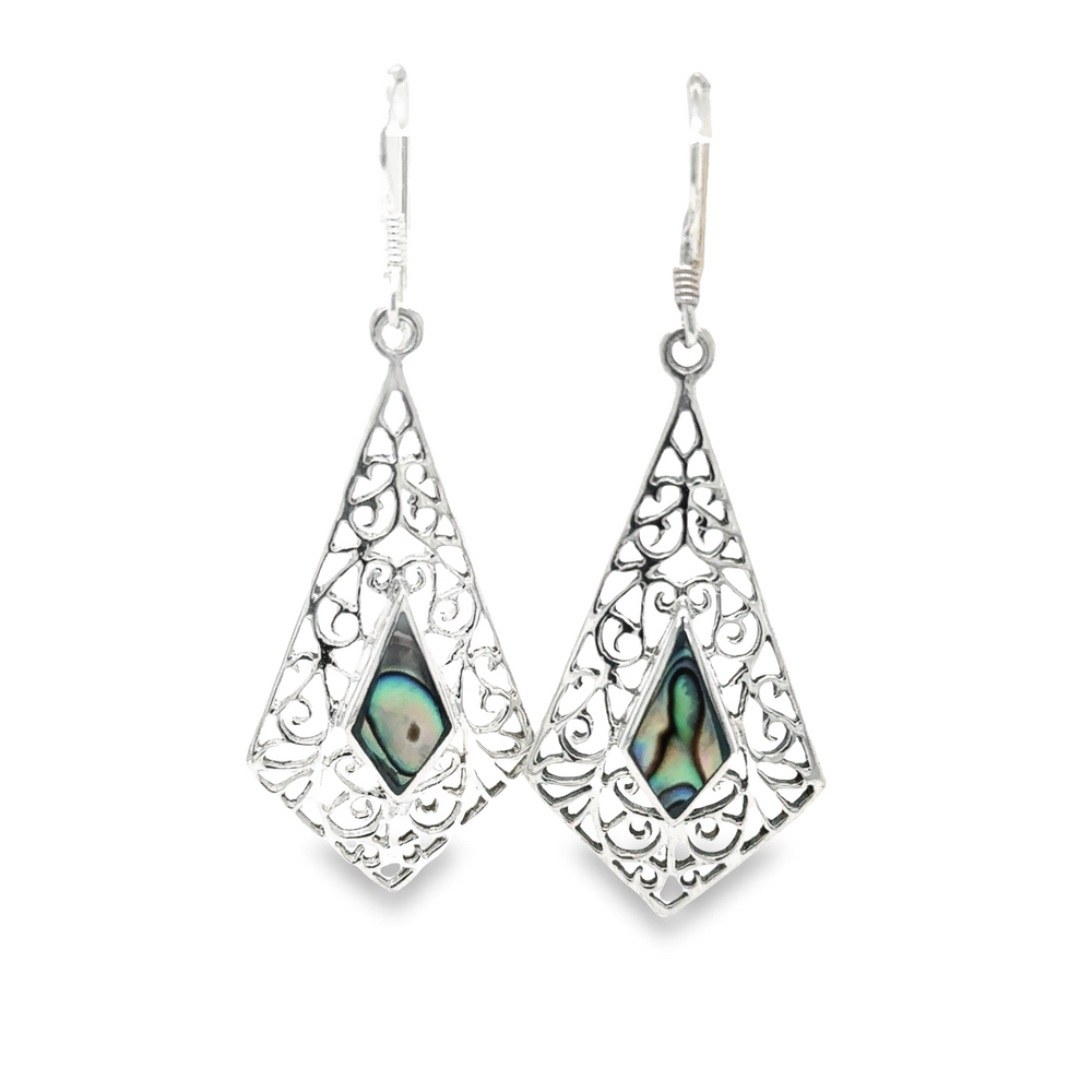 
                  
                    A pair of Elongated Diamond Teardrop Earrings with Inlaid Stones by Super Silver, with intricate filigree patterns and an inlaid black abalone shell.
                  
                