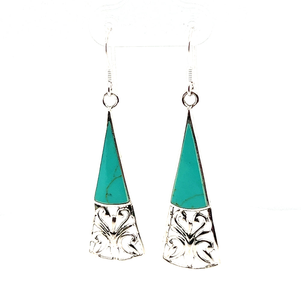 
                  
                    A pair of Super Silver Long Triangle Filigree Earrings with Inlaid Stone, with a captivating bohemian charm and nature-inspired beauty.
                  
                