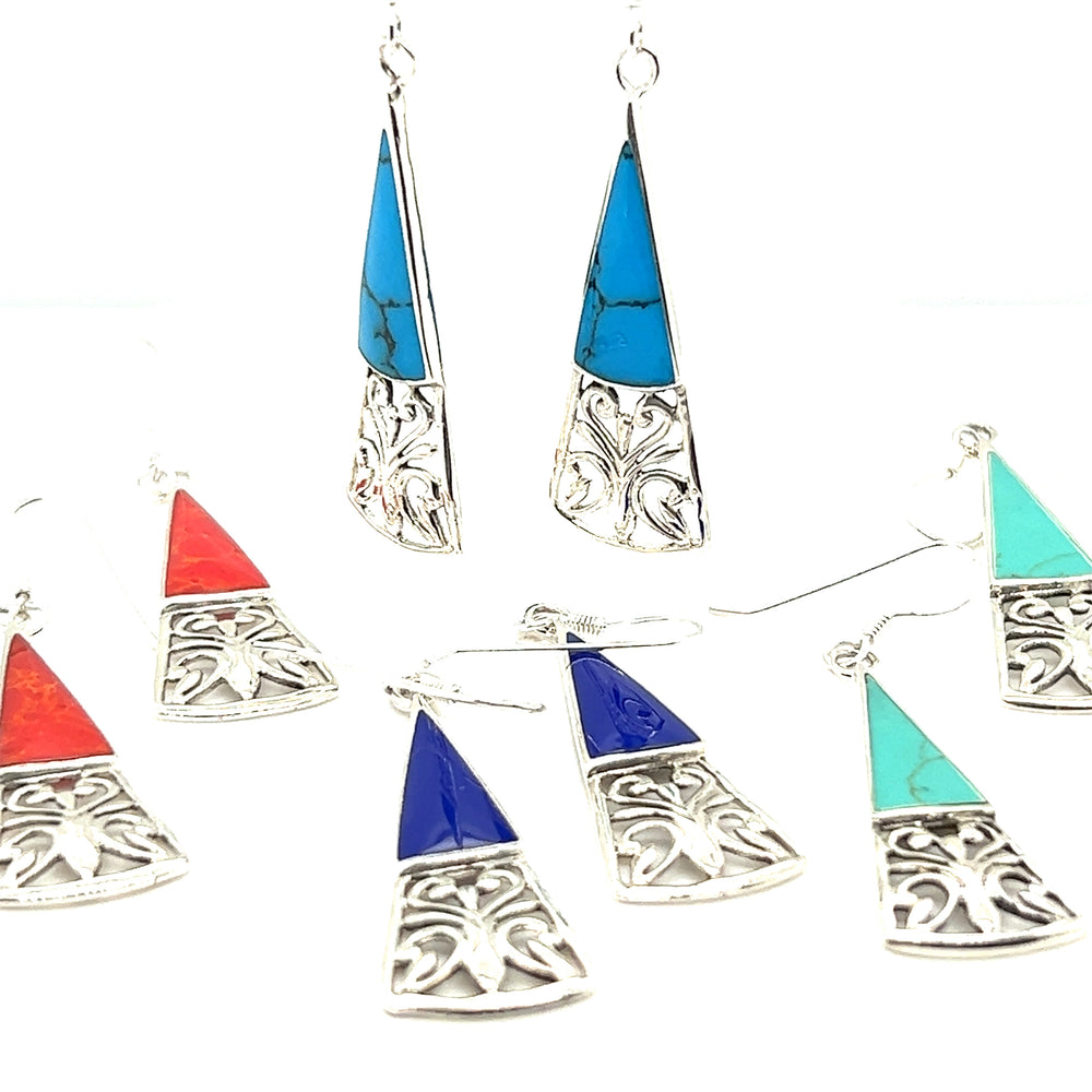 Super Silver's Long Triangle Filigree Earrings with Inlaid Stone, featuring turquoise and blue stones, exude a nature-inspired beauty and bohemian charm.