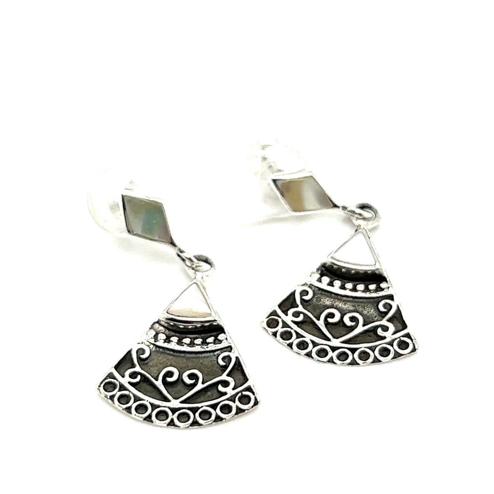 
                  
                    A pair of Bohemian Style Filigree Earrings with Inlay Stones by Super Silver, with geometric designs.
                  
                