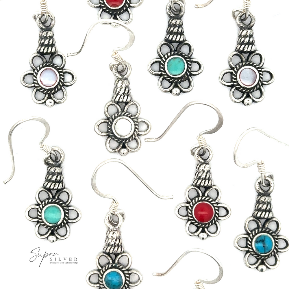A collection of Flower Design Earrings With a Round Stone featuring ornate, floral-themed designs with six different stones. Each earring boasts a round stone in blue, white, pink, red, and turquoise hues. The background is white.