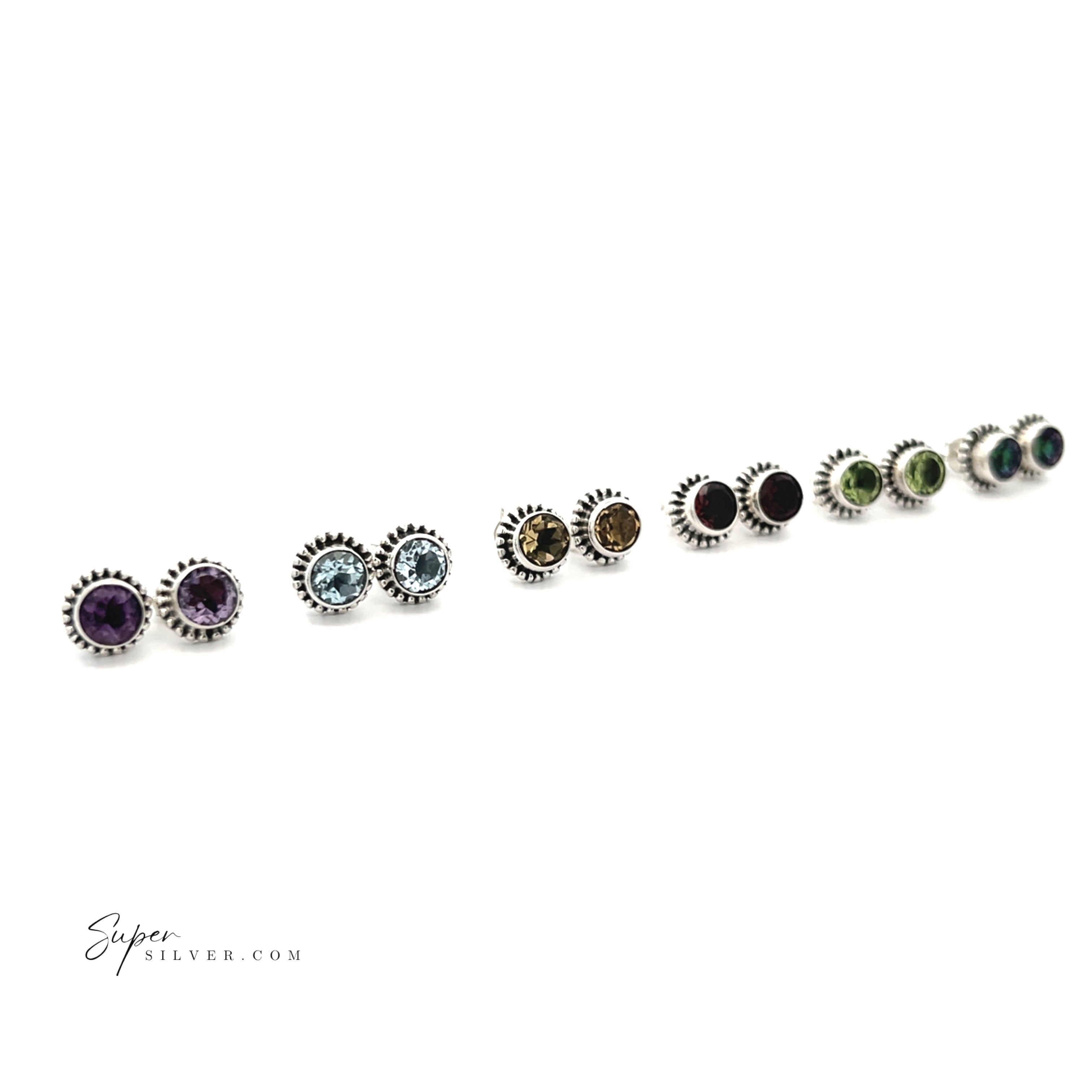 Nine pairs of Beaded Round Faceted Gemstone Studs in various colors are displayed in a row on a white background, each pair set in sterling silver for a classic look.