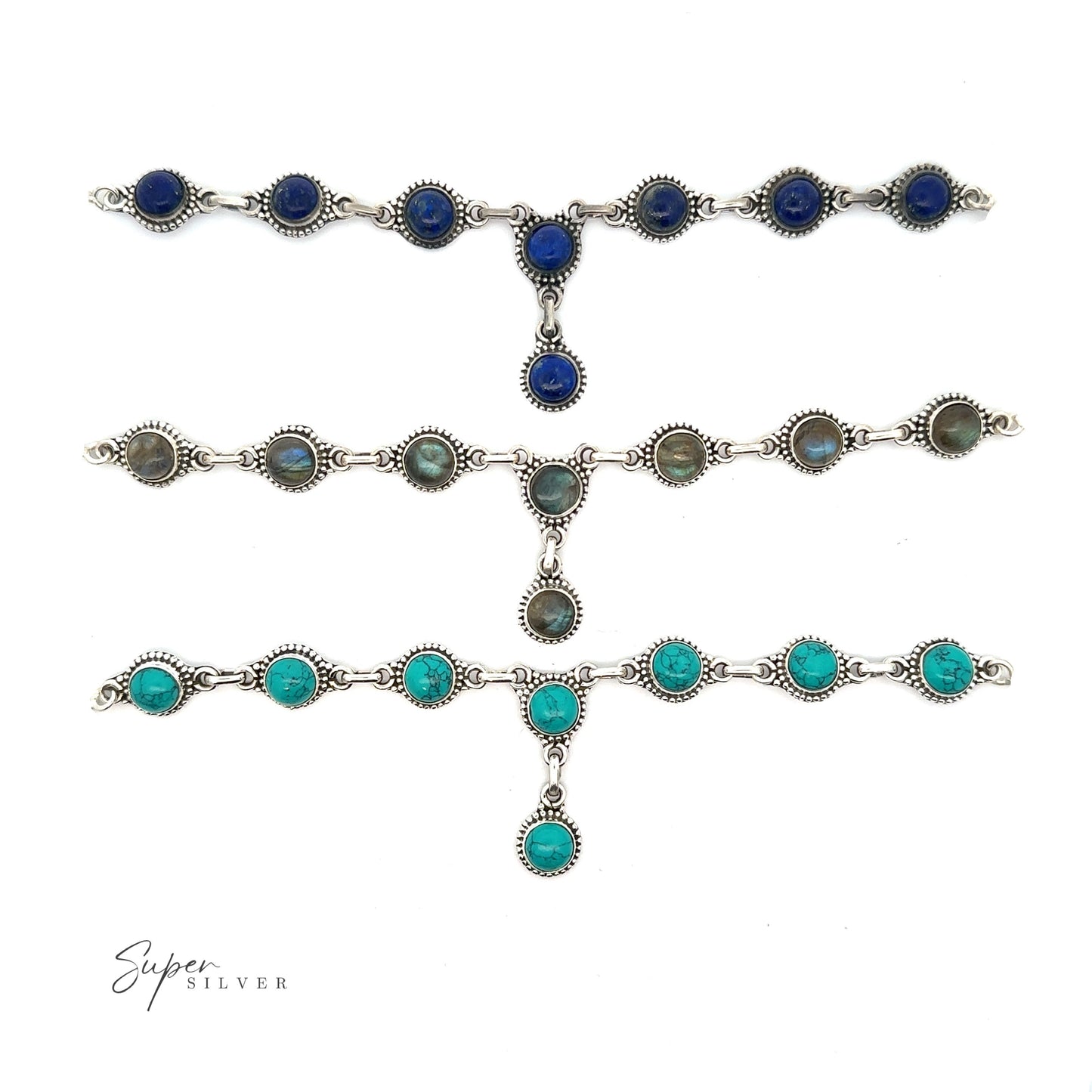 
                  
                    Three Round Gemstone Y Necklaces with Ball Border with turquoise, green, and dark blue stones arranged in a row, reflecting the bohemian style jewelry trend. The brand "Super Silver" logo is visible in the bottom left corner.
                  
                