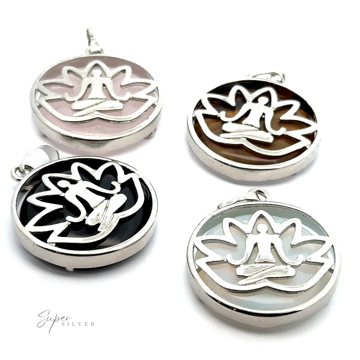 Four Silver Plated Lotus Meditation Pendants with Gemstone, each featuring a seated figure in a meditation pose. The pendants have different colored backgrounds: pink, brown, black, and white.