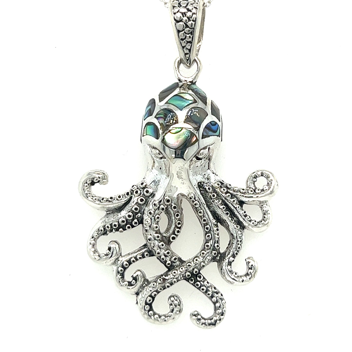 An intricately designed Super Silver Statement Octopus Pendant with Inlay Stones, adorned with inlay stone details, set against a pristine white background.