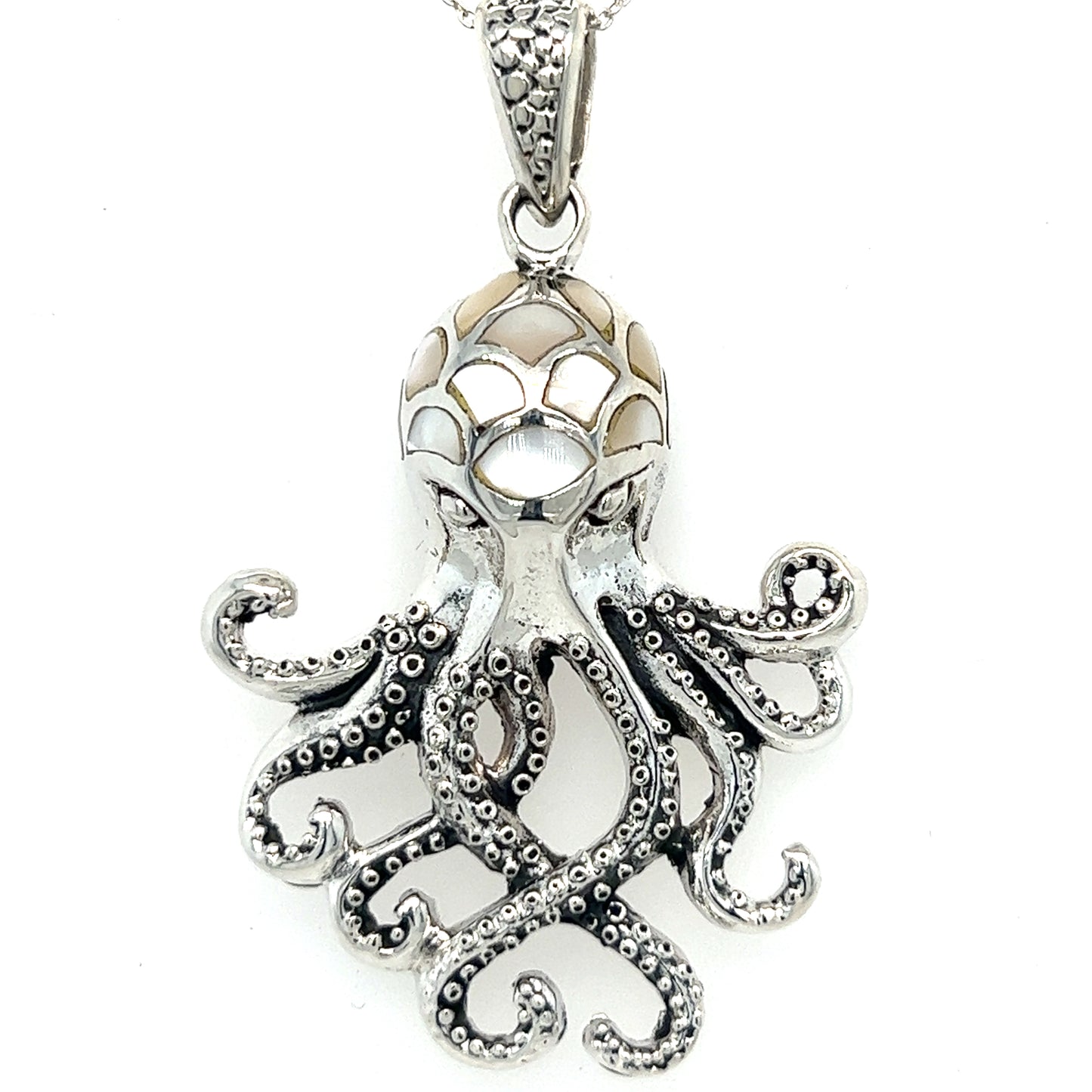 
                  
                    This exquisite Super Silver chain necklace features a captivating Statement Octopus Pendant with Inlay Stones. The unique design of the pendant adds depth and symbolism to this beautiful piece of jewelry.
                  
                