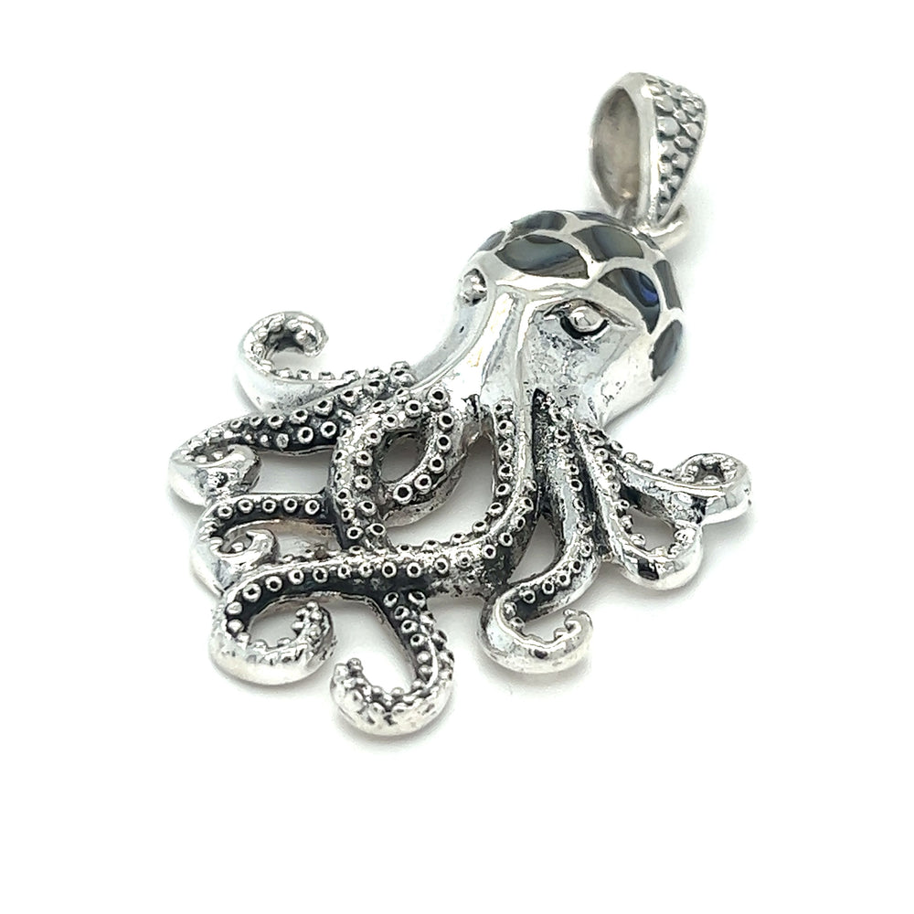 
                  
                    A symbolically intricate Super Silver octopus pendant with inlay stone details, crafted in sterling silver.
                  
                