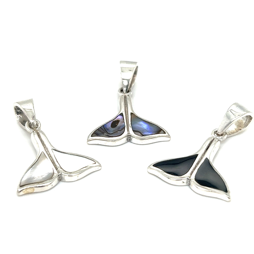 Three Super Silver Simple Whale Tail Pendants with Inlay Stones on a white background.