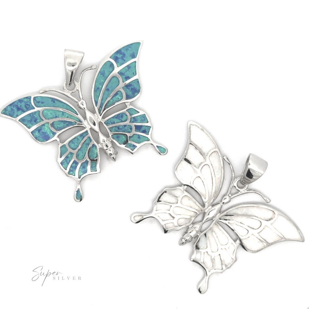 
                  
                    Two Statement Lab-Created Opal Butterfly Pendants: one features segments of turquoise and sterling silver, while the other is crafted entirely from sterling silver. Both pendants exhibit intricate wing designs, embellished with lab-created opal accents.
                  
                