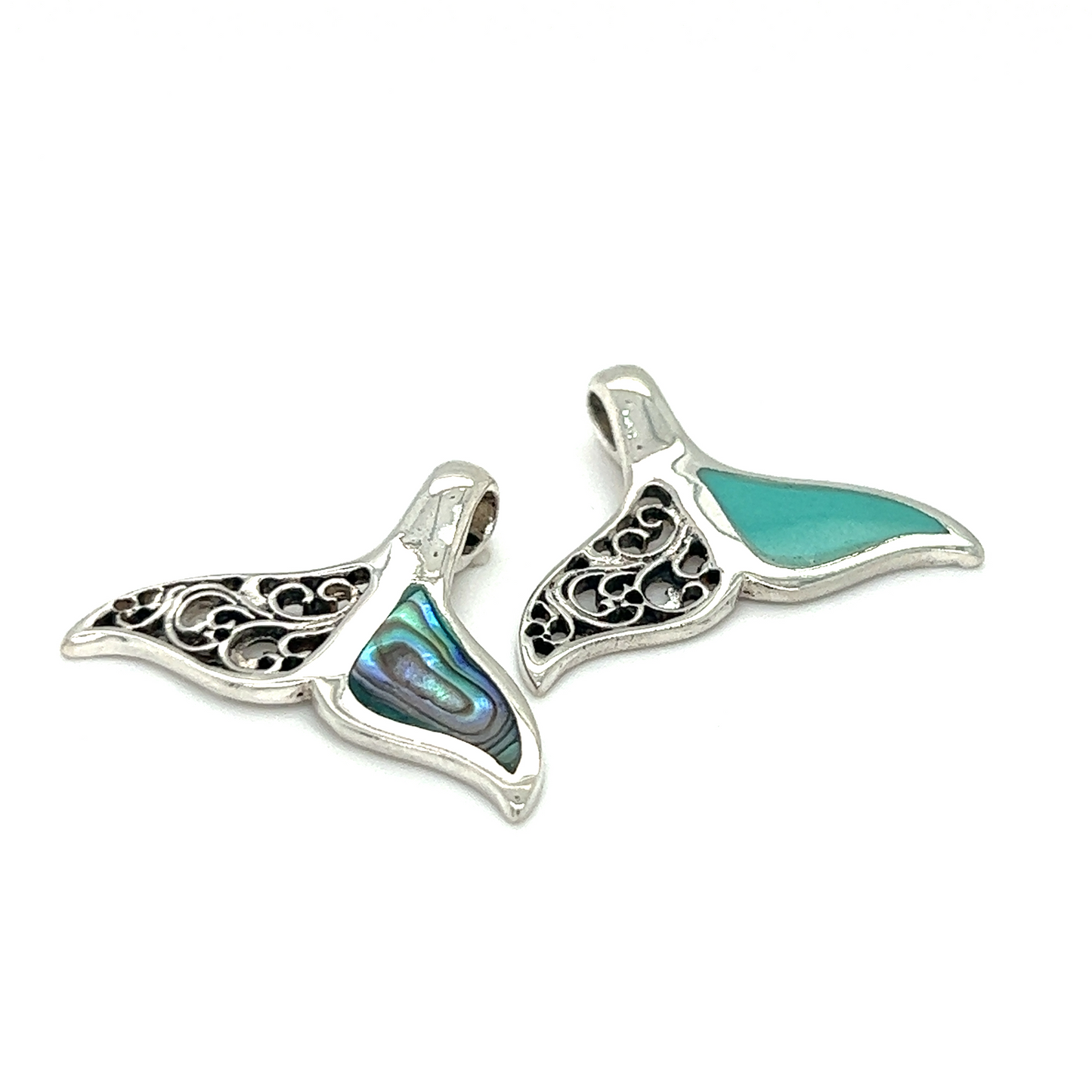 A pair of Half Filigree Whale Tail Pendants perfect for ocean conservation enthusiasts and supporters of Oceana.