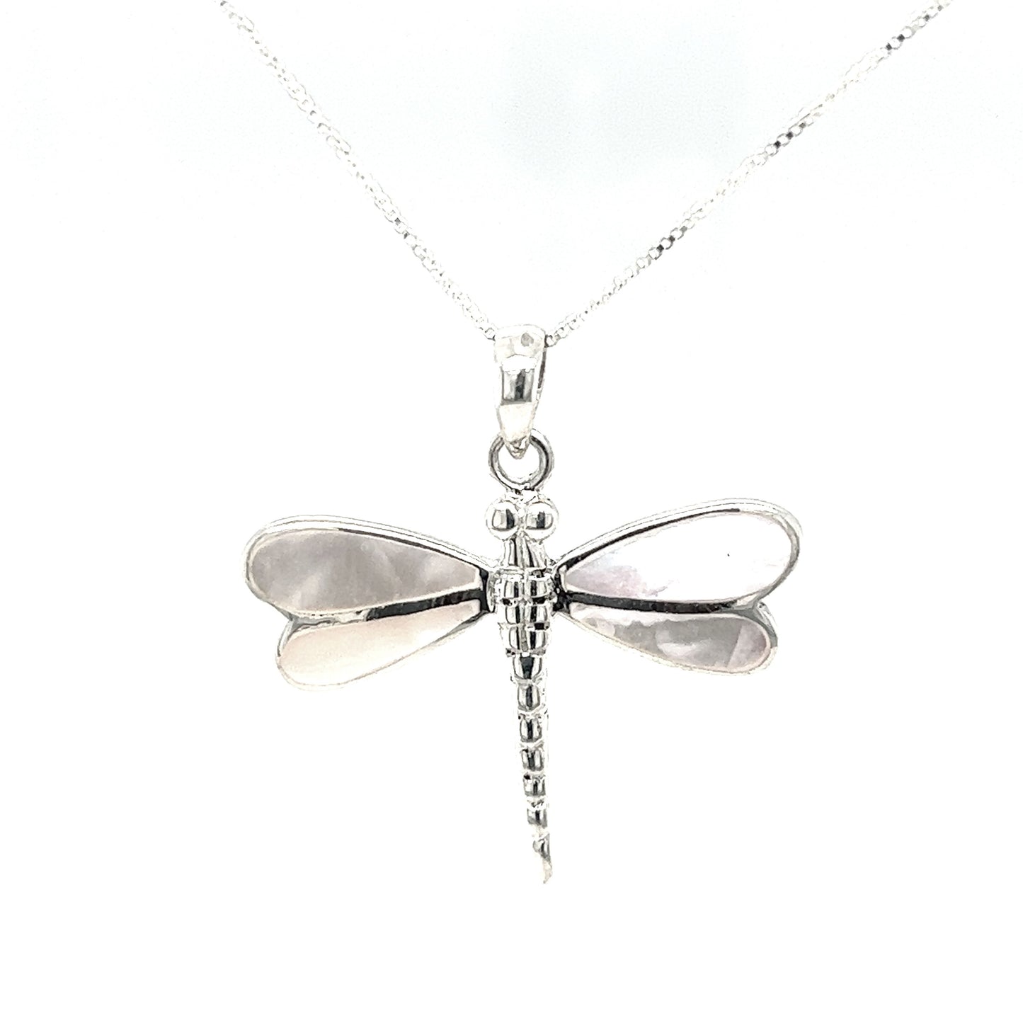 
                  
                    A stunning Super Silver Dragonfly Inlay Stone pendant adorned with intricate mother of pearl detailing, elegantly hanging from a delicate chain.
                  
                