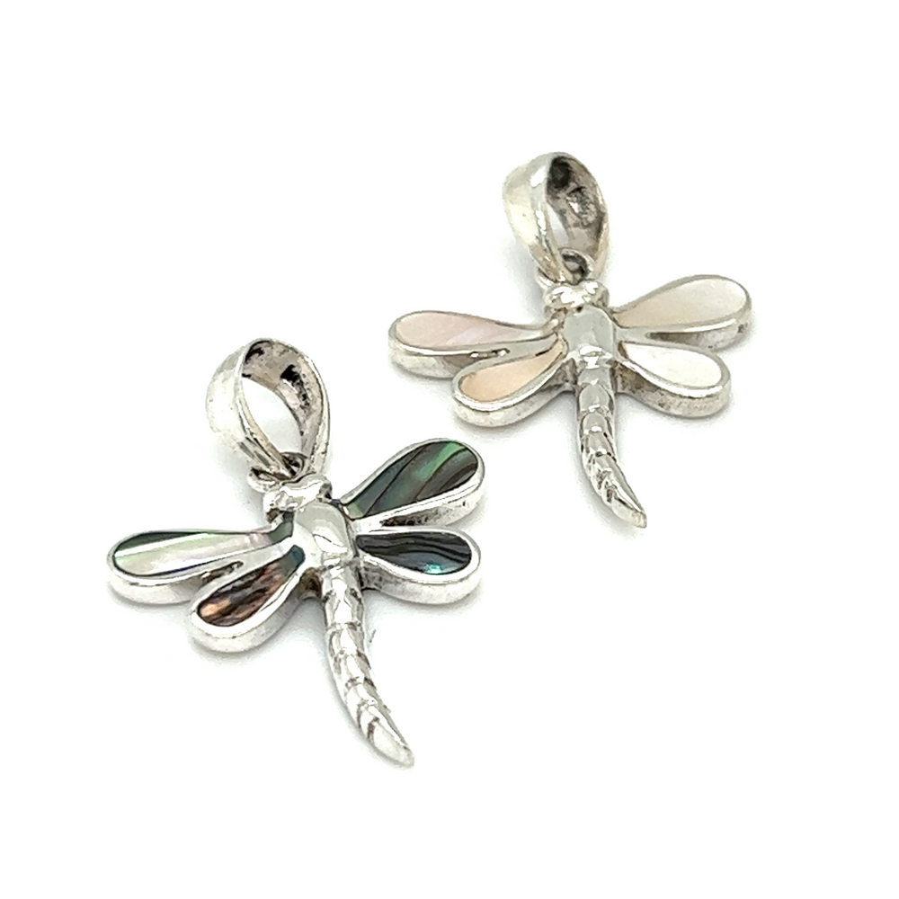 Two Inlay Stone Dragonfly pendants on a white background for a charming and elegant accessory.
