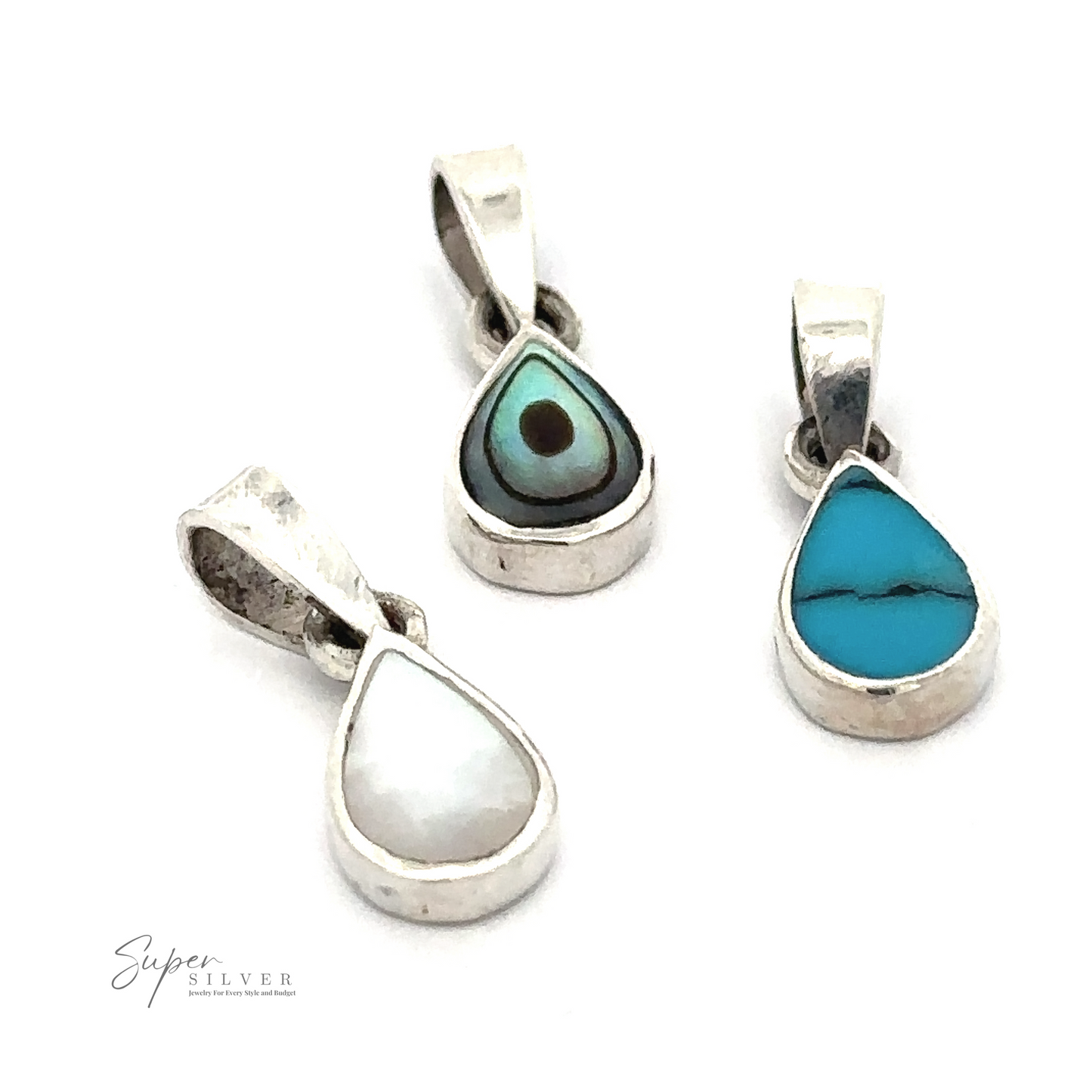 
                  
                    Three sterling silver pendants with teardrop-shaped turquoise, evil eye, and mother of pearl stones displayed on a white background. Perfect for those who appreciate minimal jewelry, each Tiny Inlay Teardrop Pendant adds a subtle touch of elegance.
                  
                