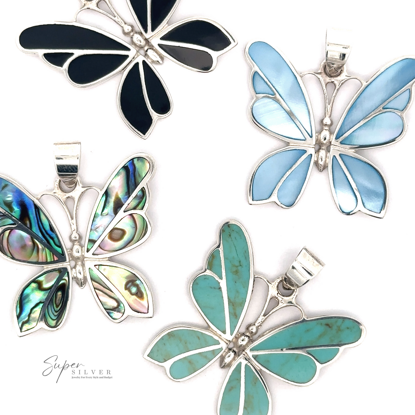 
                  
                    Four Medium Inlay Butterfly Pendants in silver frames, decorated with various colorful inlays including blue, green, and iridescent patterns, arranged on a white background. The "Super Silver" logo sits elegantly in the corner.
                  
                