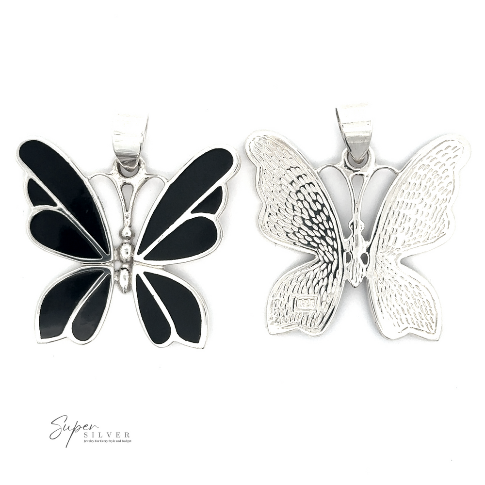 
                  
                    Two Medium Inlay Butterfly Pendants are displayed side by side. The left one features black enamel accents, while the right one showcases intricate silver detailing. This sterling silver jewelry embodies transformation, perfect for those who appreciate finely crafted butterfly pendant pieces.
                  
                