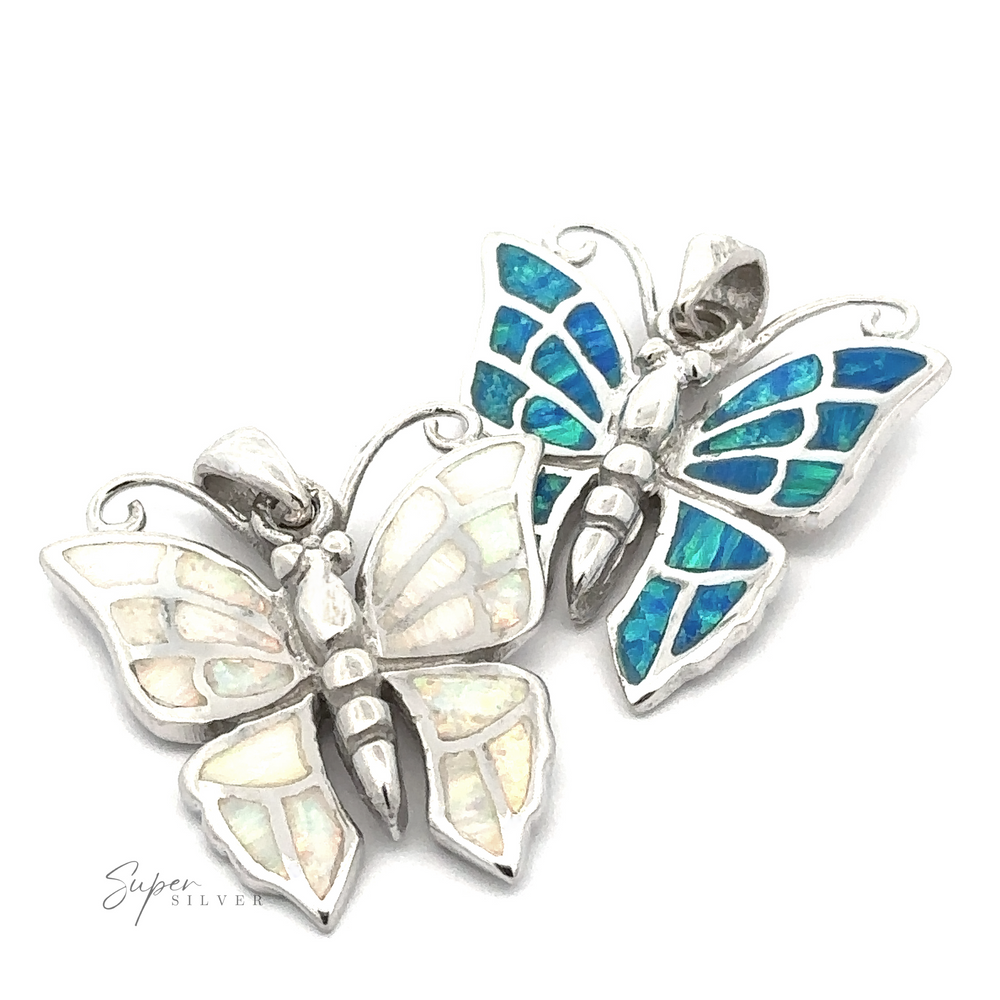 
                  
                    The Lab-Created Opal Butterfly Pendant collection includes two sterling silver pendants adorned with mother-of-pearl and lab-created opal inlays. One pendant showcases white hues, while the other displays vibrant blue and green tones, making them perfect additions to any opal jewelry collection.
                  
                