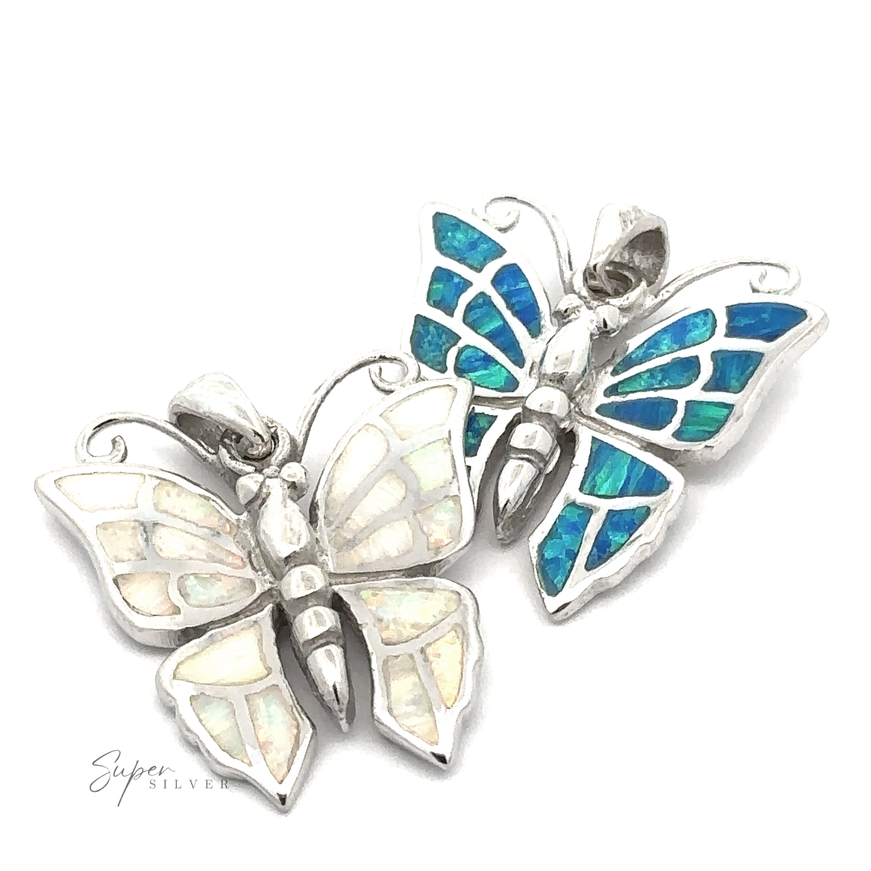 The Lab-Created Opal Butterfly Pendant collection includes two sterling silver pendants adorned with mother-of-pearl and lab-created opal inlays. One pendant showcases white hues, while the other displays vibrant blue and green tones, making them perfect additions to any opal jewelry collection.