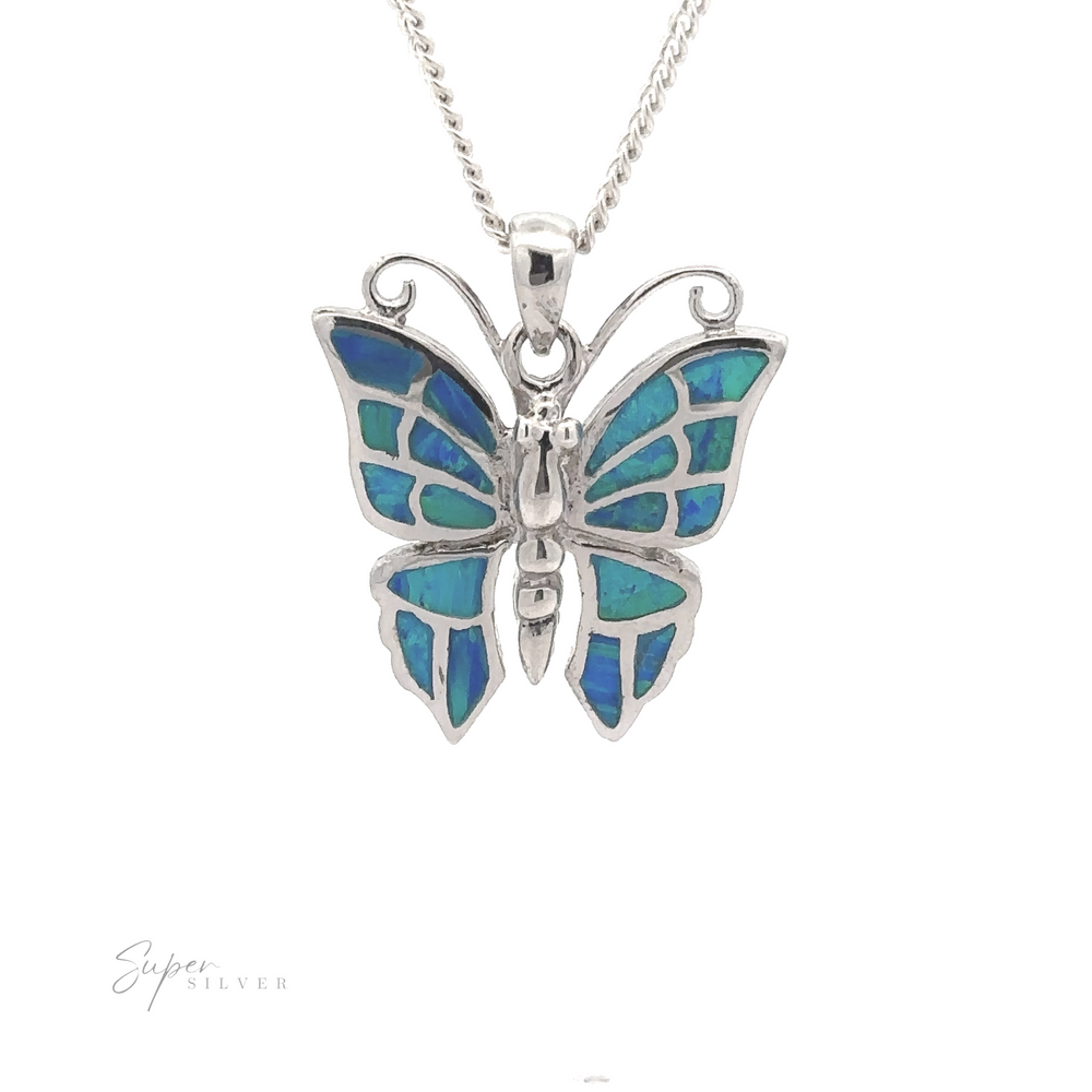 
                  
                    Pendentif papillon en opale créée en laboratoire
                  
                