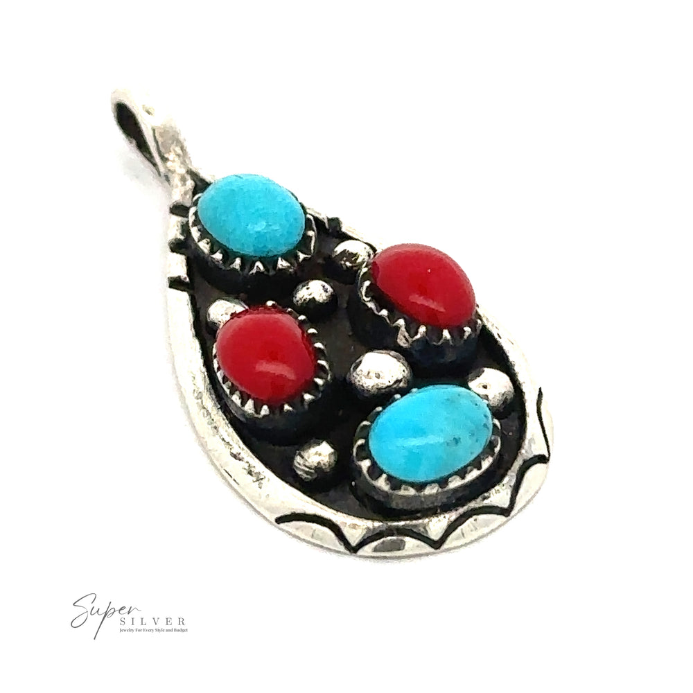 A Teardrop Turquoise and Coral Pendant in silver, featuring two turquoise stones and two coral stones, with intricate detailing.
