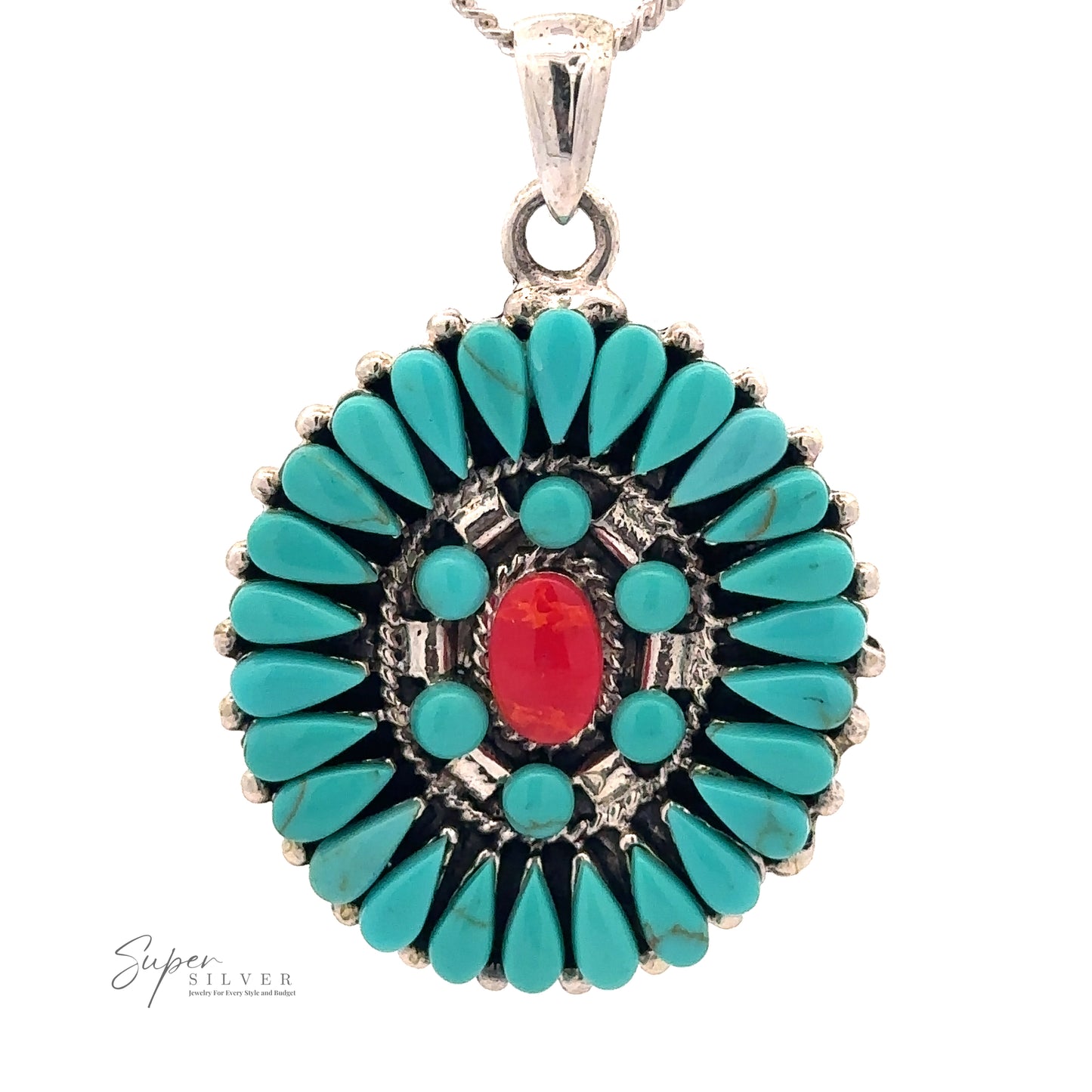 
                  
                    An oval silver Turquoise Pendant With Coral Center, hanging from a silver chain, evokes a Native American-inspired design that mirrors the exquisite Navajo needlepoint style.
                  
                