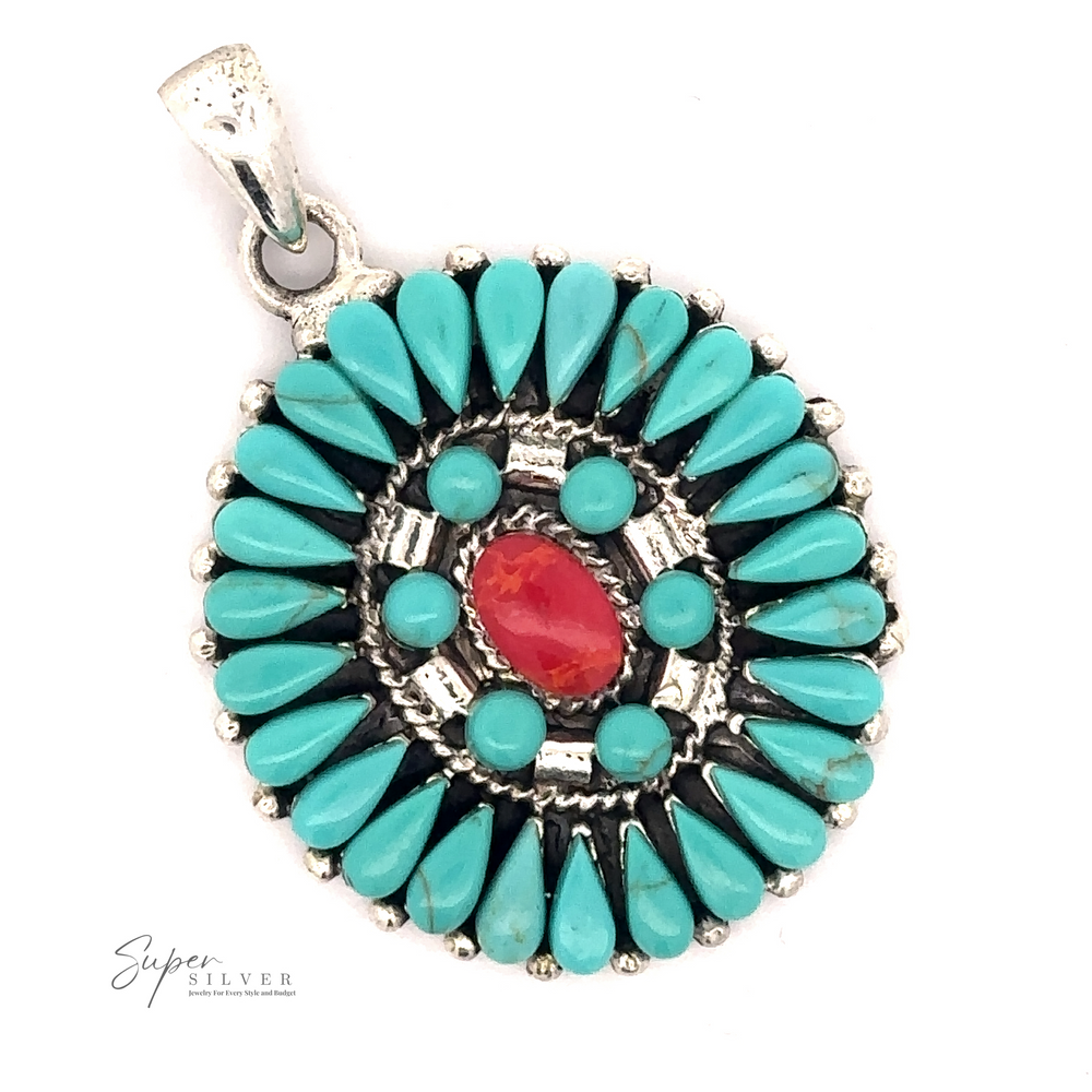 
                  
                    A Turquoise Pendant With Coral Center featuring turquoise stones arranged in a floral, Native American-inspired pattern with a central red stone. The "Super Silver" logo is visible on the bottom left.
                  
                