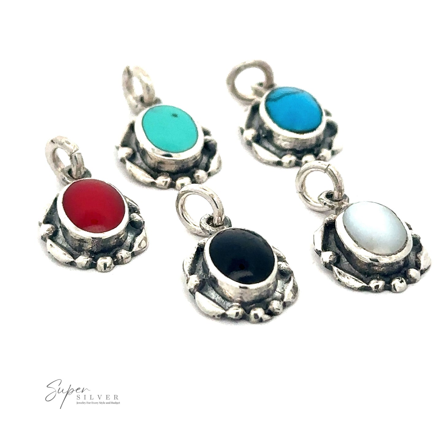 
                  
                    Five Beautiful Oval Stone Pendants With Silver Border with oval-shaped gemstones in various colors: red coral, blue turquoise, deep blue, black, and white, arranged against a white background.
                  
                