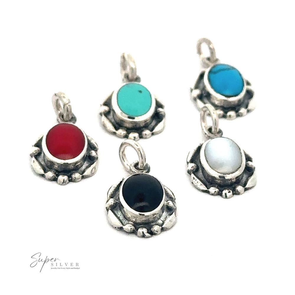 Five Beautiful Oval Stone Pendants With Silver Border with different colored stones—turquoise, blue, red, black, and white—arranged in a row. Text reads "Super Silver.