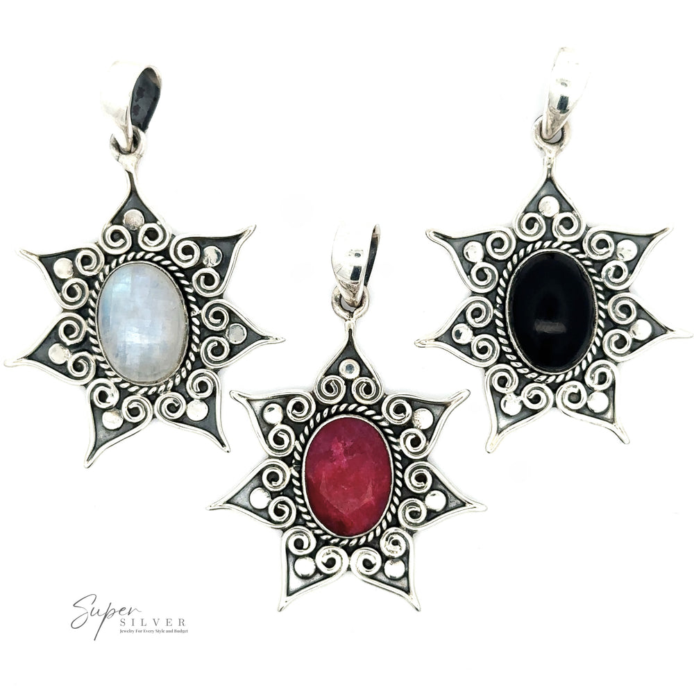 
                  
                    Three Floral Design Gemstone Pendants with intricate .925 Sterling Silver designs. Each pendant features an oval gemstone: one blue, one red, and one black. A logo reading "Super Silver" is visible at the bottom left.
                  
                