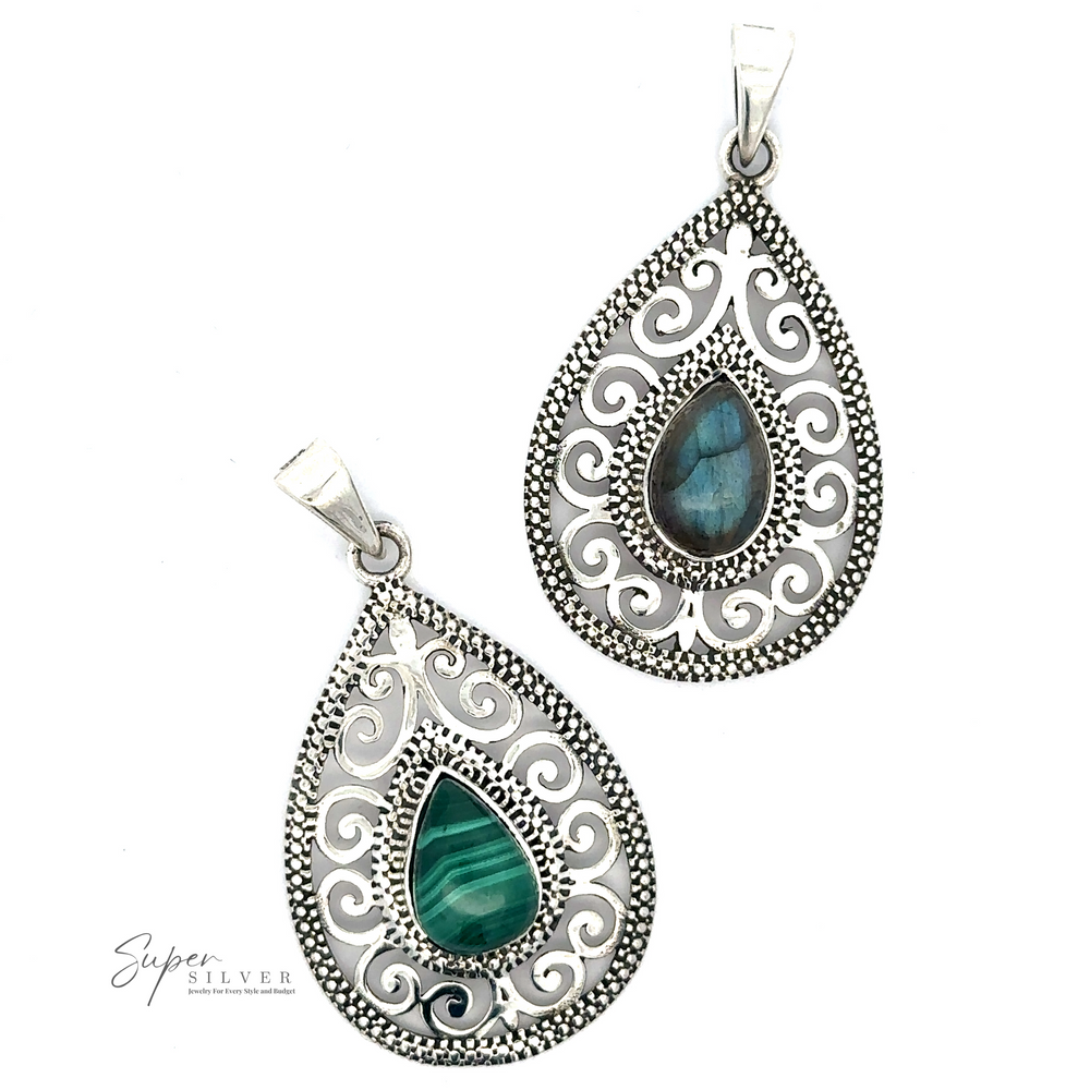 
                  
                    Two intricately designed **Gemstone Teardrop Pendants with Swirls** featuring ornate scroll patterns and central stones—one green and one Labradorite.
                  
                