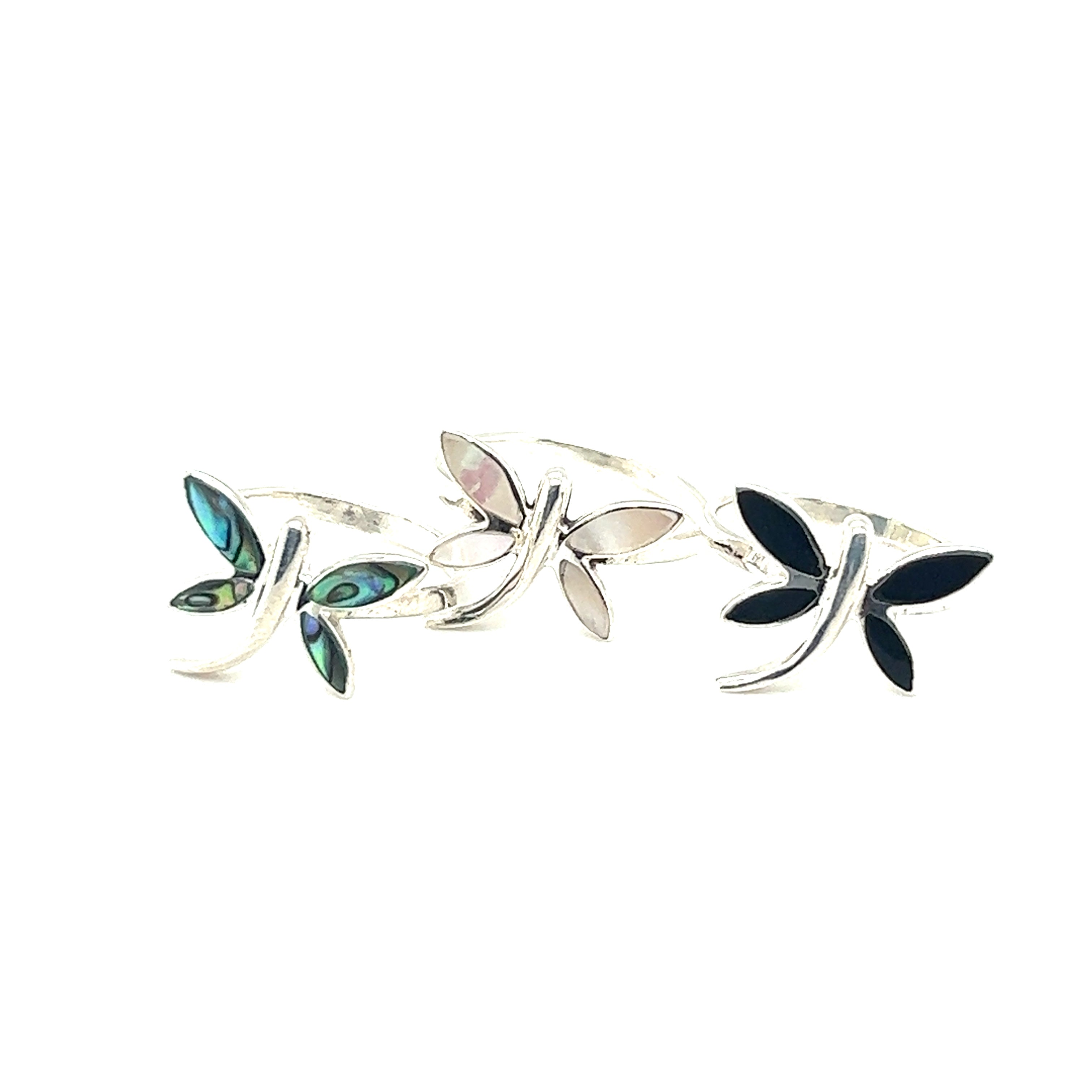 Three Inlay Stone Dragonfly Rings on a white background.