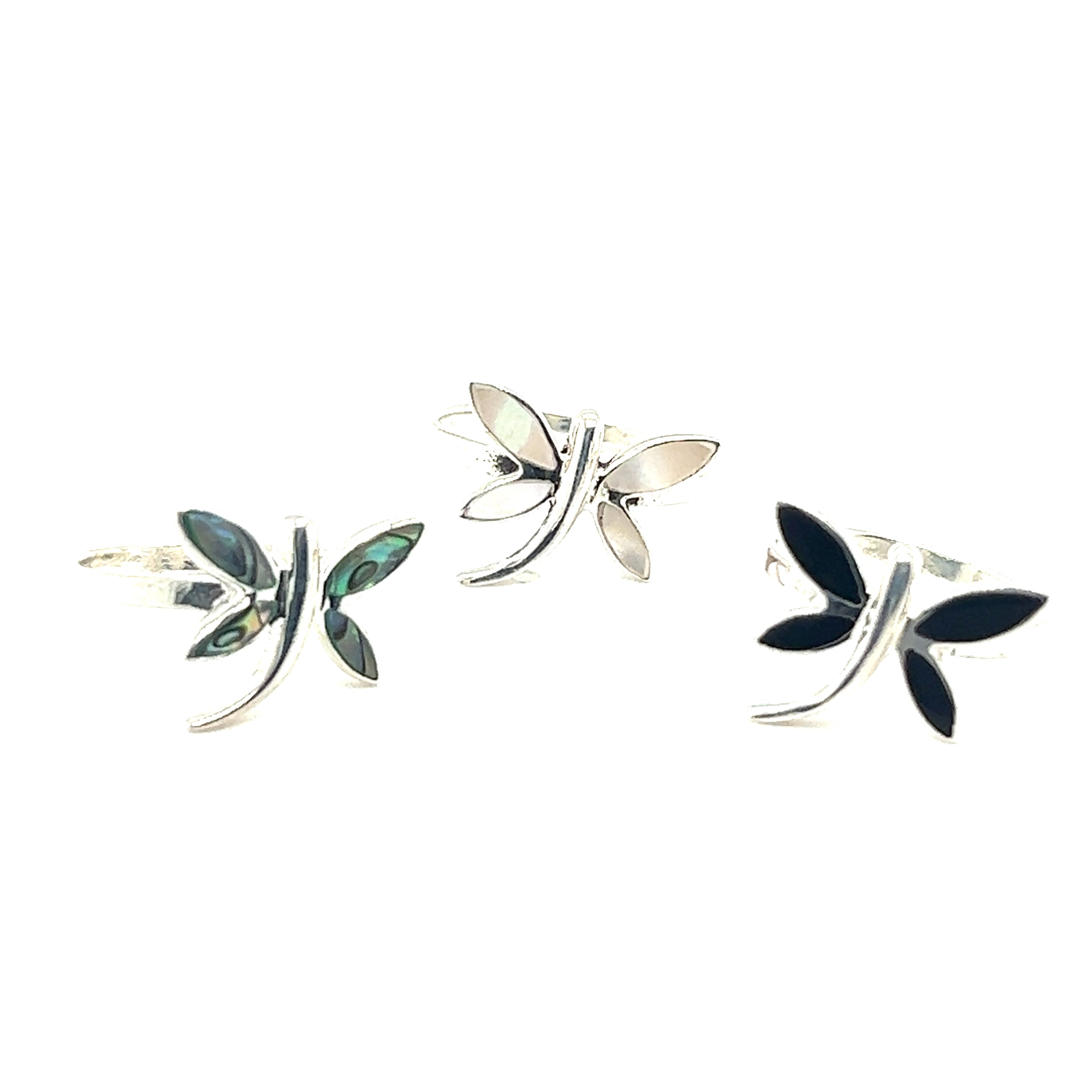 Three Inlay Stone Dragonfly Rings on a white background.