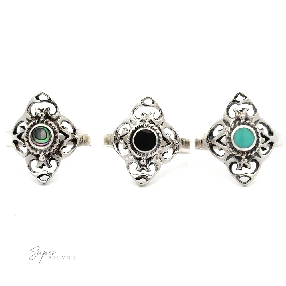 A group of Filigree Inlaid Stone Rings, in different colors.
