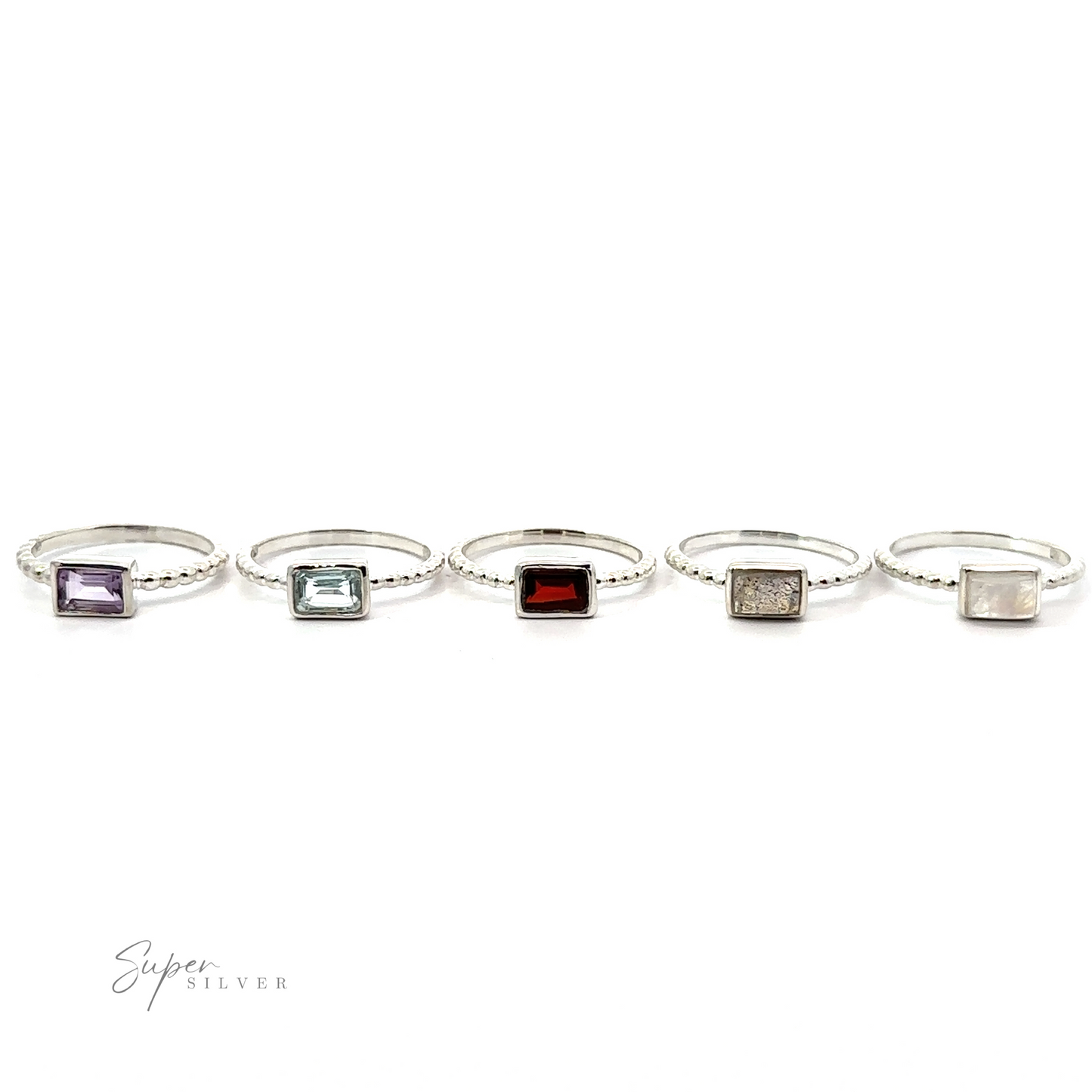 
                  
                    A collection of five Rectangular Gemstone Rings with Beaded Bands, each featuring a different color and shape of the gemstone centerpiece, displayed in a row against a white background.
                  
                