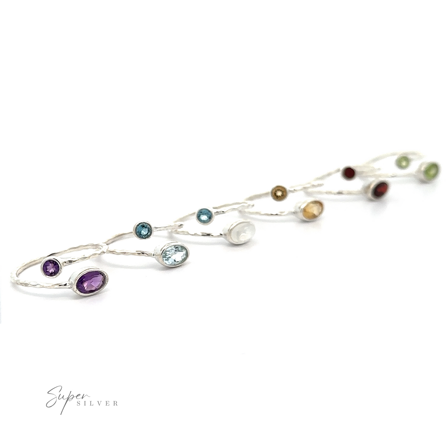 
                  
                    A Textured Adjustable Band with Adorned Gemstones bracelet with multicolored gemstones on a white background, serving as a statement piece.
                  
                