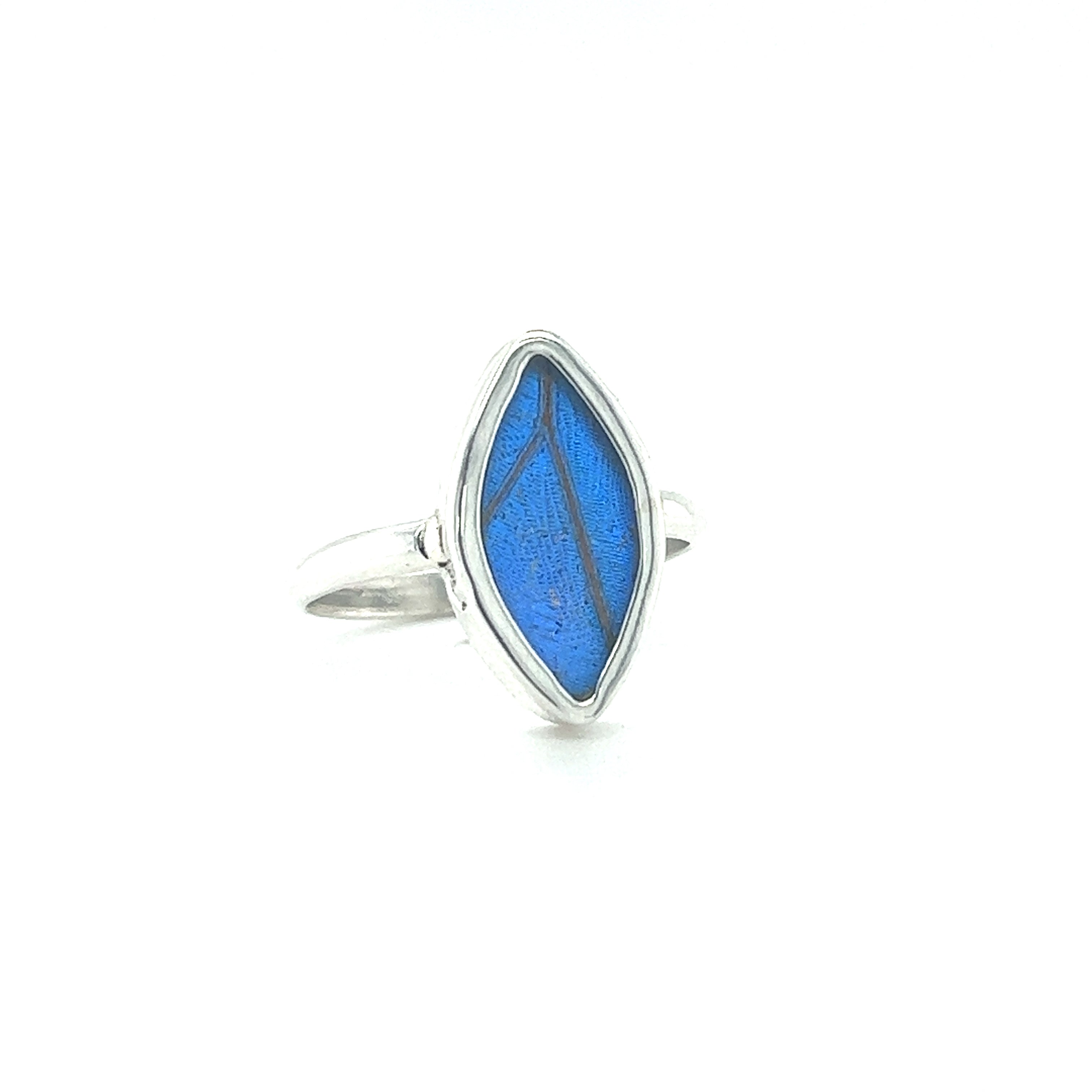 A sustainable fashion ring adorned with a delicate blue leaf, inspired by Genuine Butterfly Wing Rings in Marquise Shape.