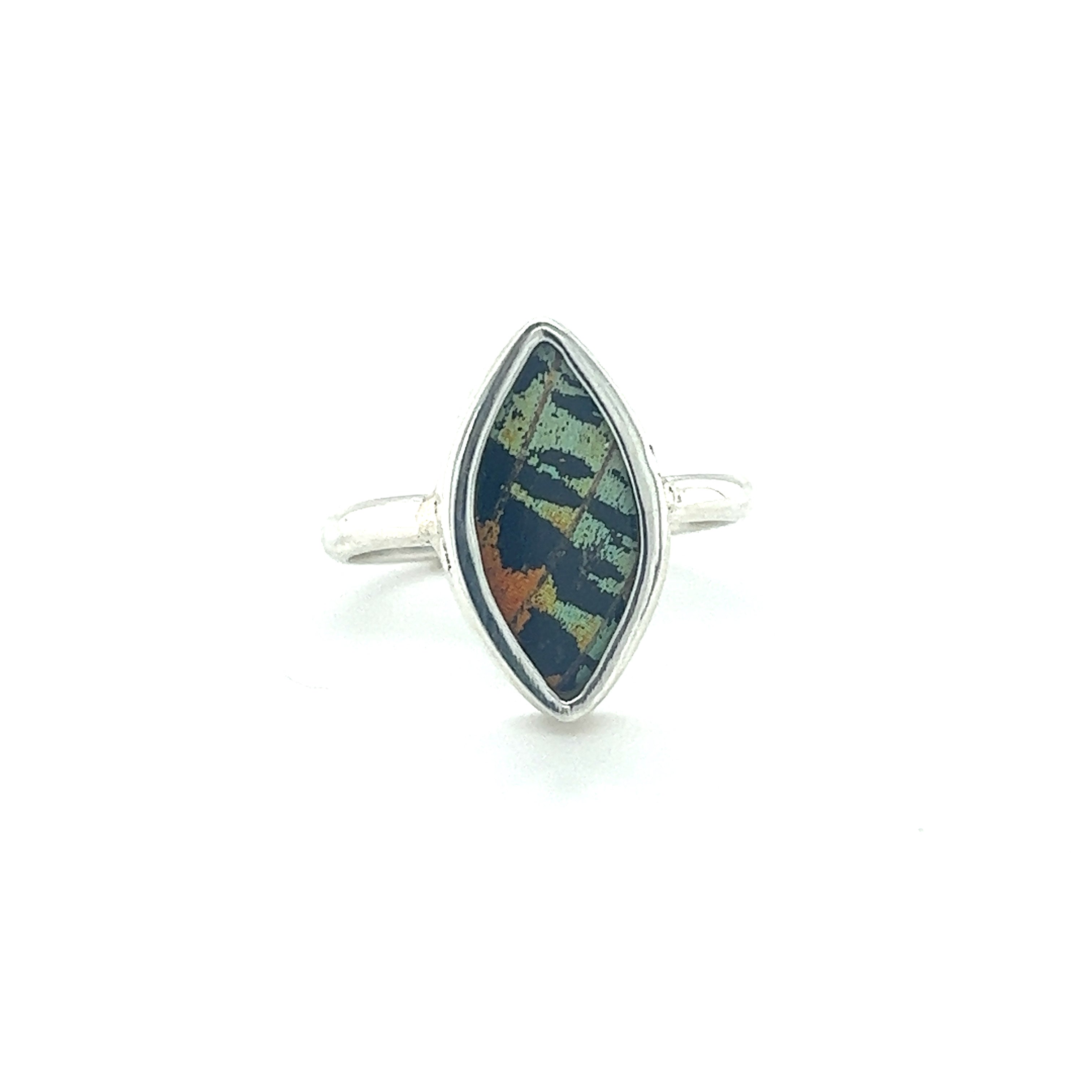 A sustainable Genuine Butterfly Wing Ring in Marquise Shape with a black and green stone made of sterling silver.