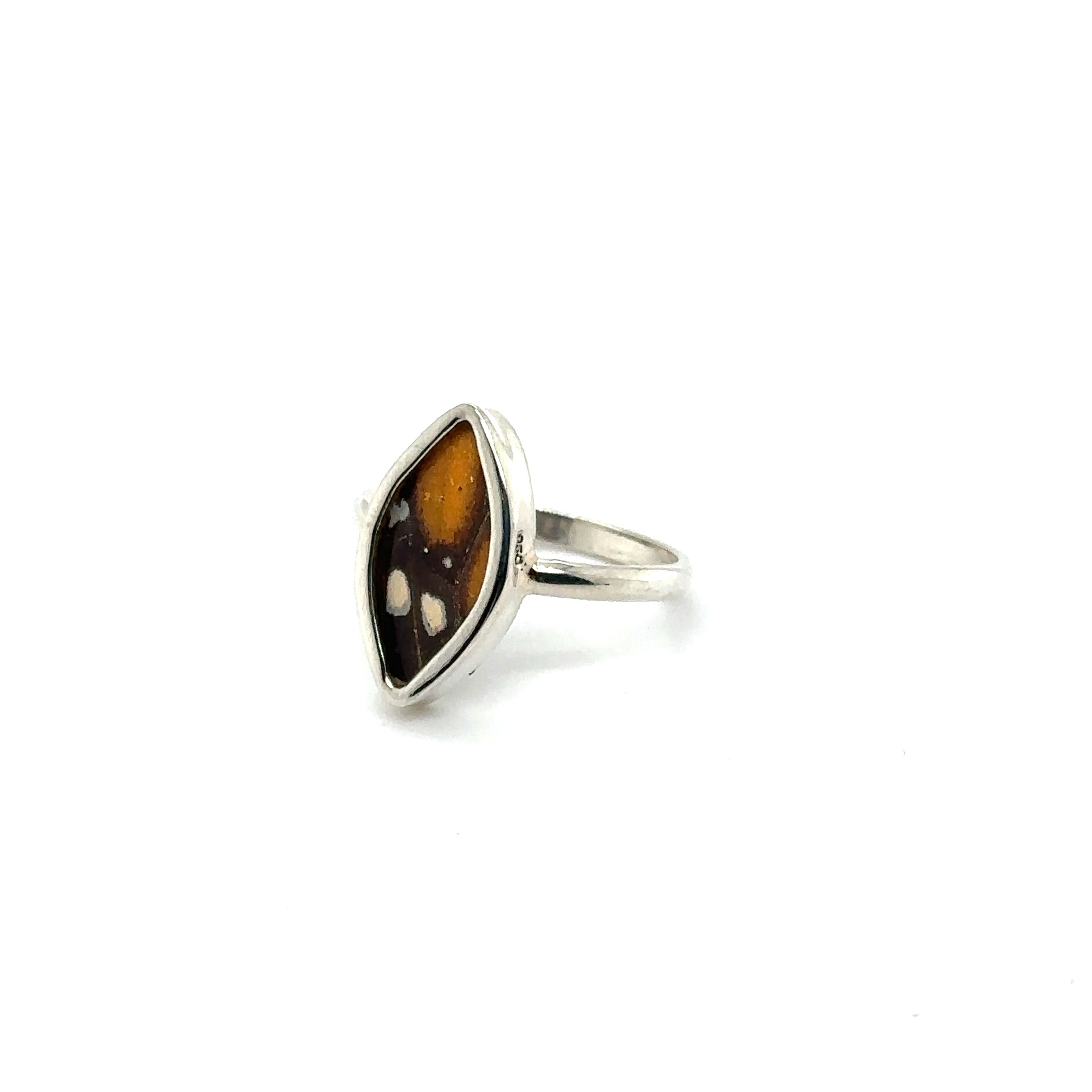 A sustainable fashion Genuine Butterfly Wing Ring in Marquise Shape with a tiger's eye stone.
